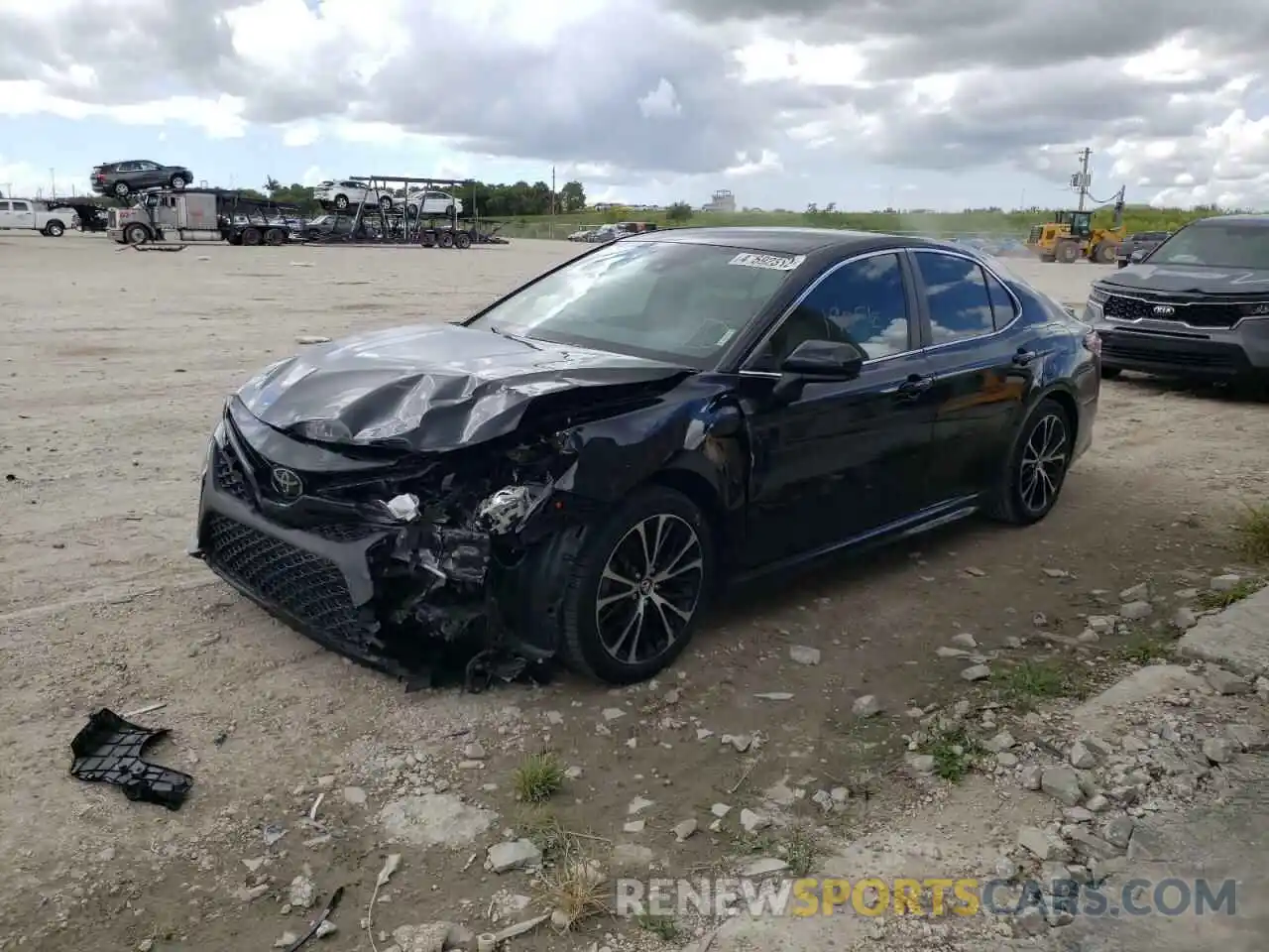 2 Photograph of a damaged car 4T1B11HK3KU794131 TOYOTA CAMRY 2019