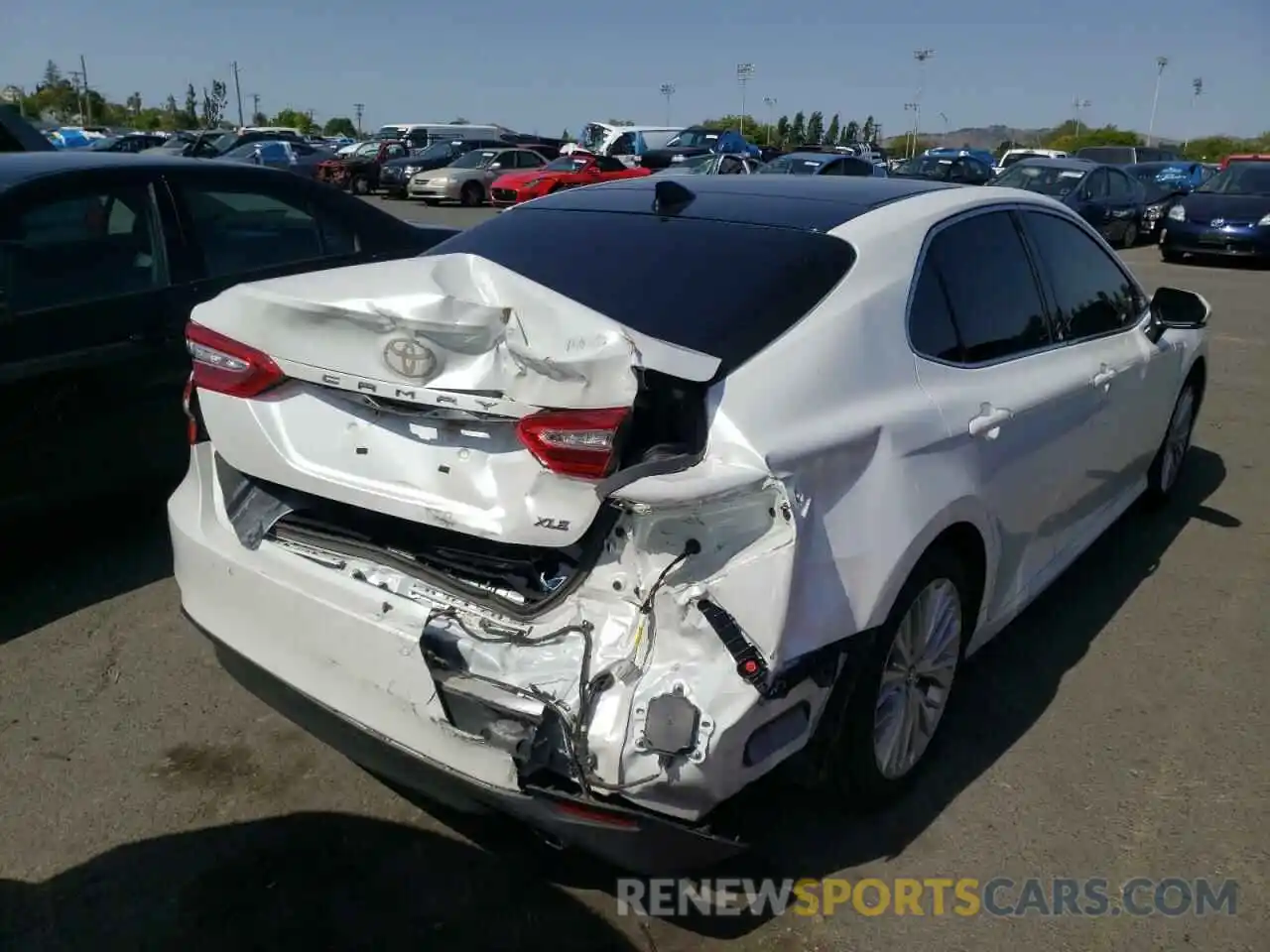 4 Photograph of a damaged car 4T1B11HK3KU795473 TOYOTA CAMRY 2019