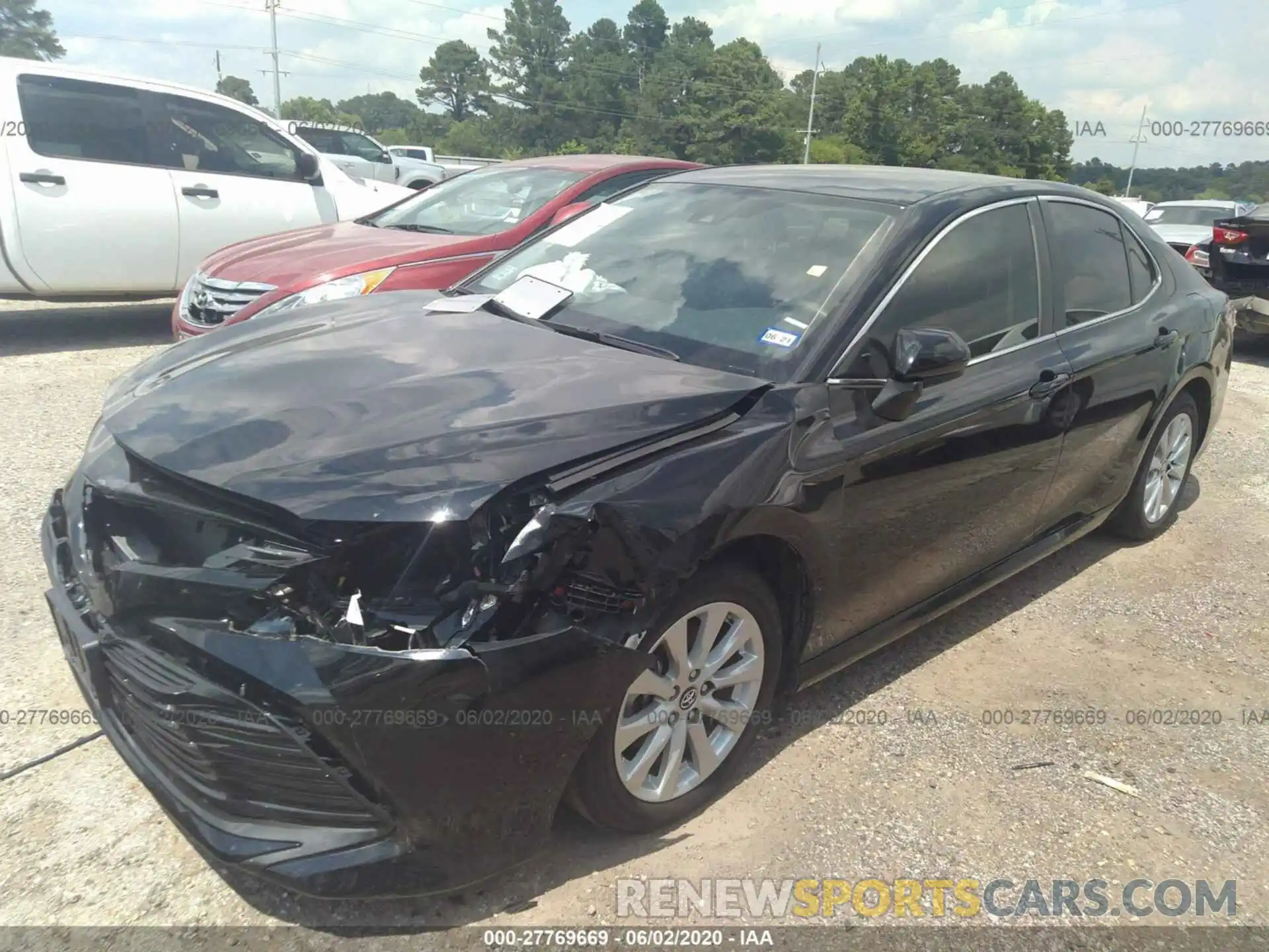 2 Photograph of a damaged car 4T1B11HK3KU797613 TOYOTA CAMRY 2019