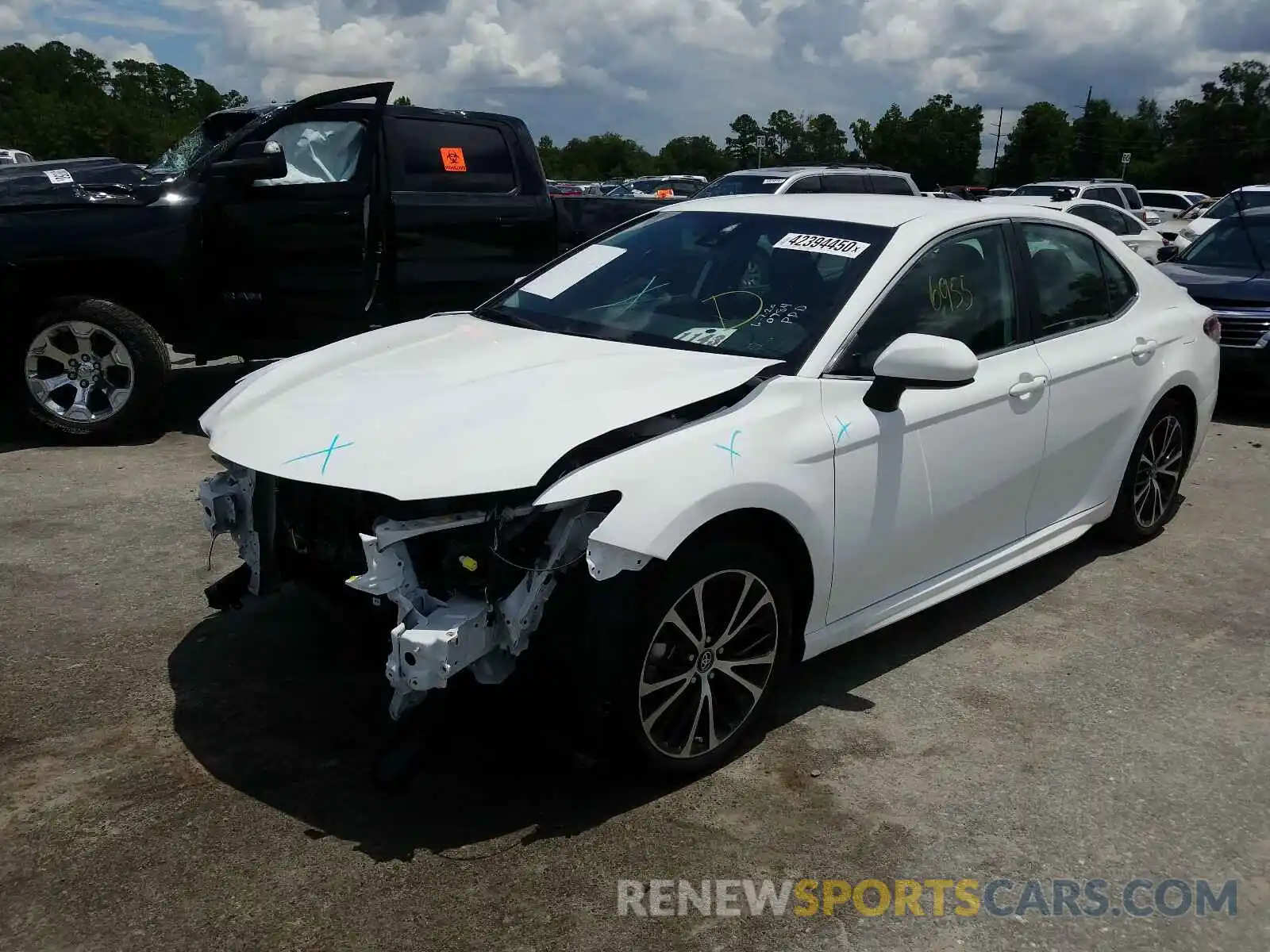 2 Photograph of a damaged car 4T1B11HK3KU800784 TOYOTA CAMRY 2019