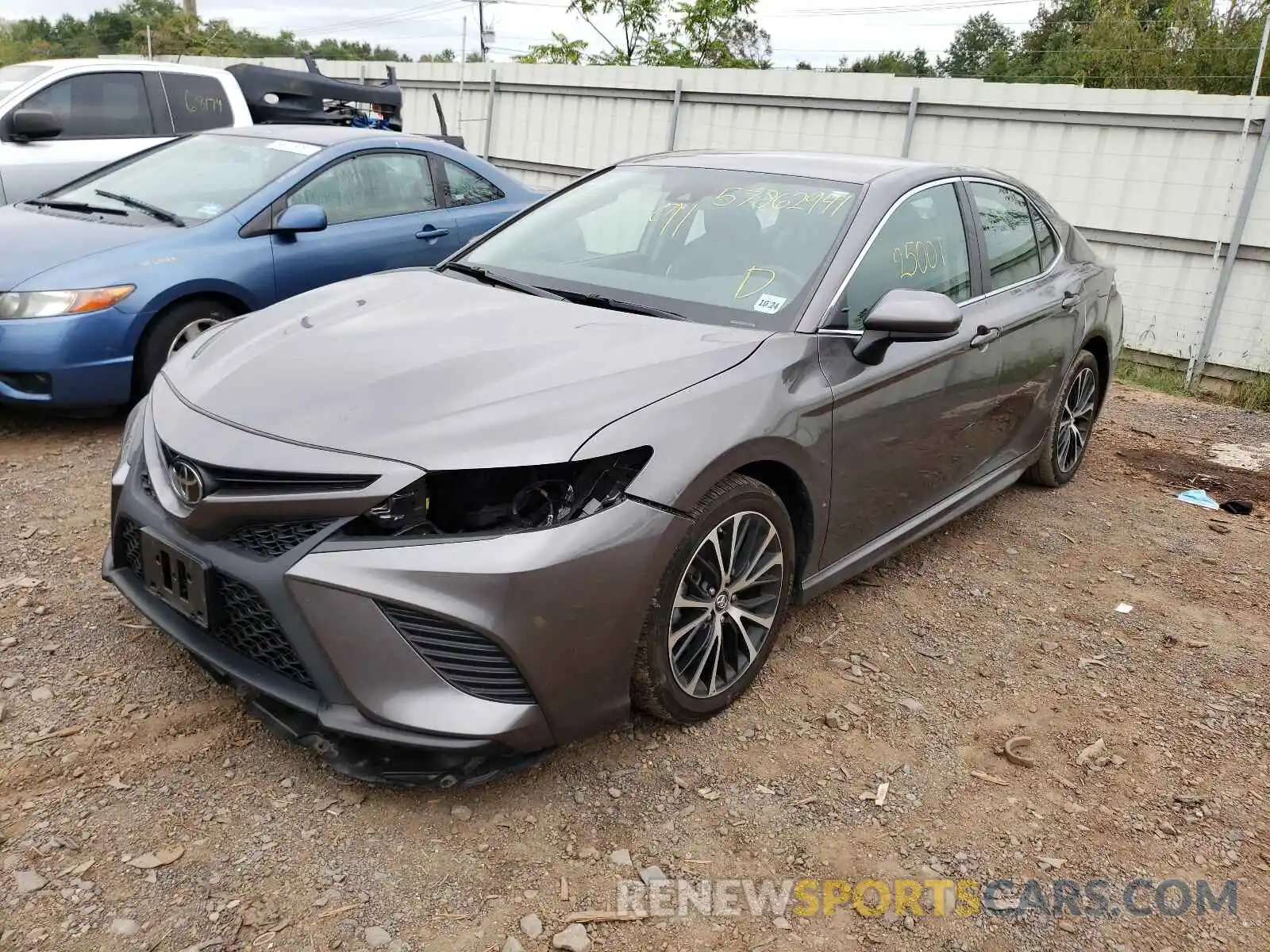 2 Photograph of a damaged car 4T1B11HK3KU801272 TOYOTA CAMRY 2019