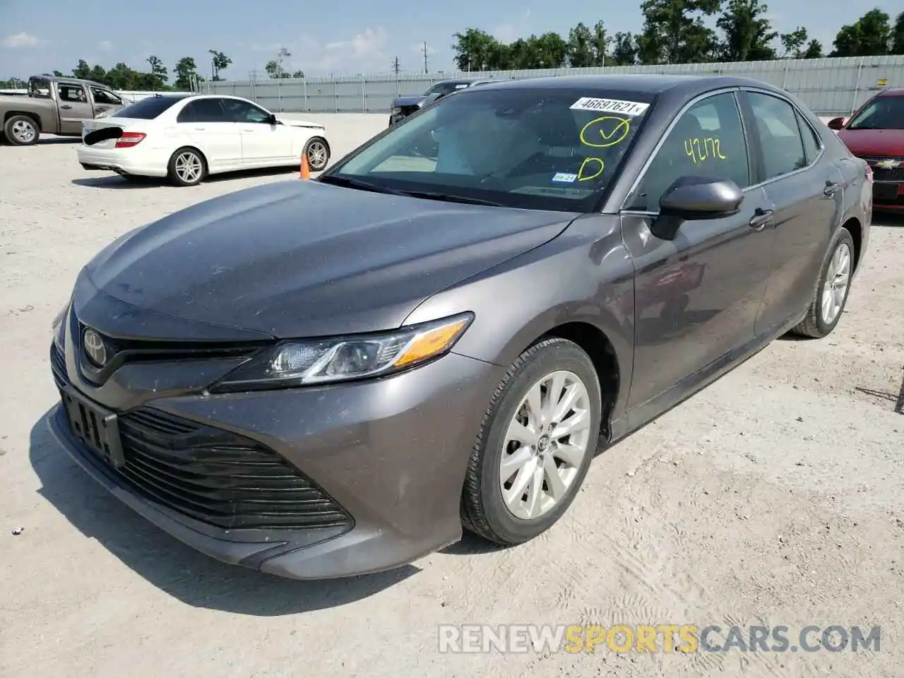 2 Photograph of a damaged car 4T1B11HK3KU801787 TOYOTA CAMRY 2019