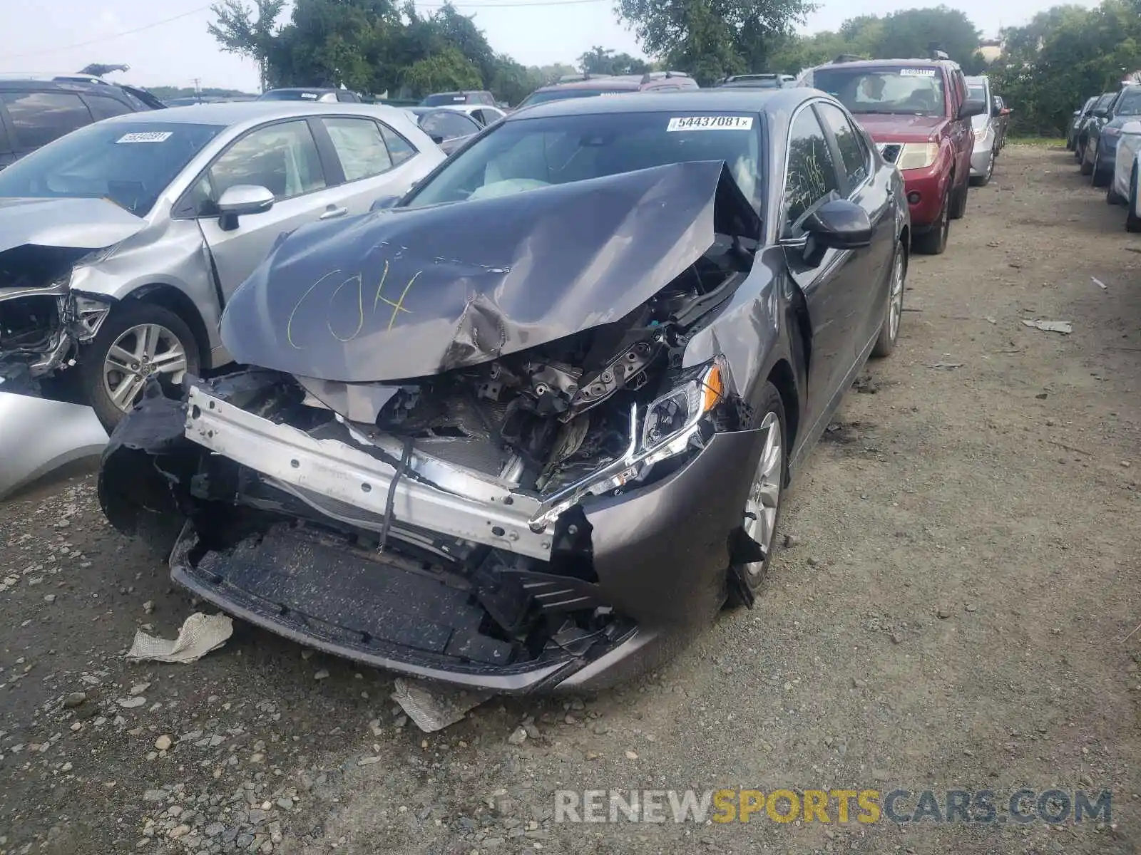 2 Photograph of a damaged car 4T1B11HK3KU801871 TOYOTA CAMRY 2019