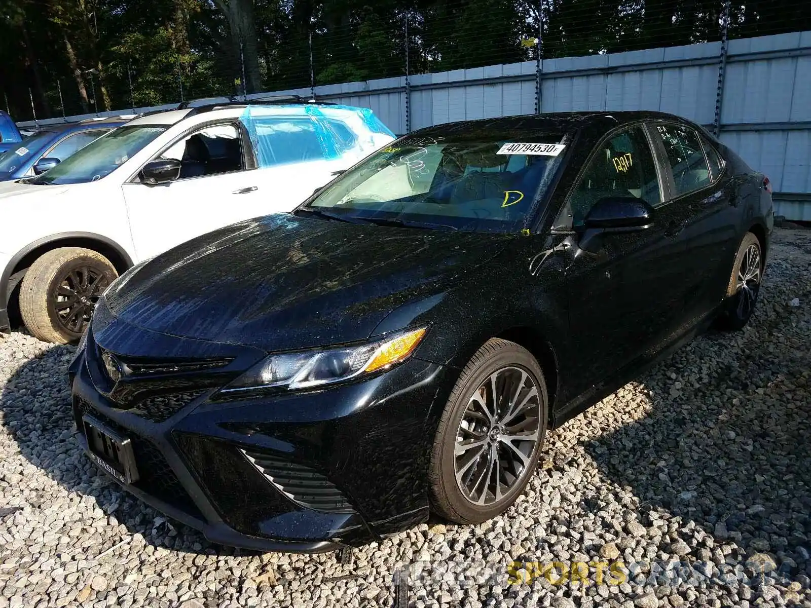 2 Photograph of a damaged car 4T1B11HK3KU803023 TOYOTA CAMRY 2019