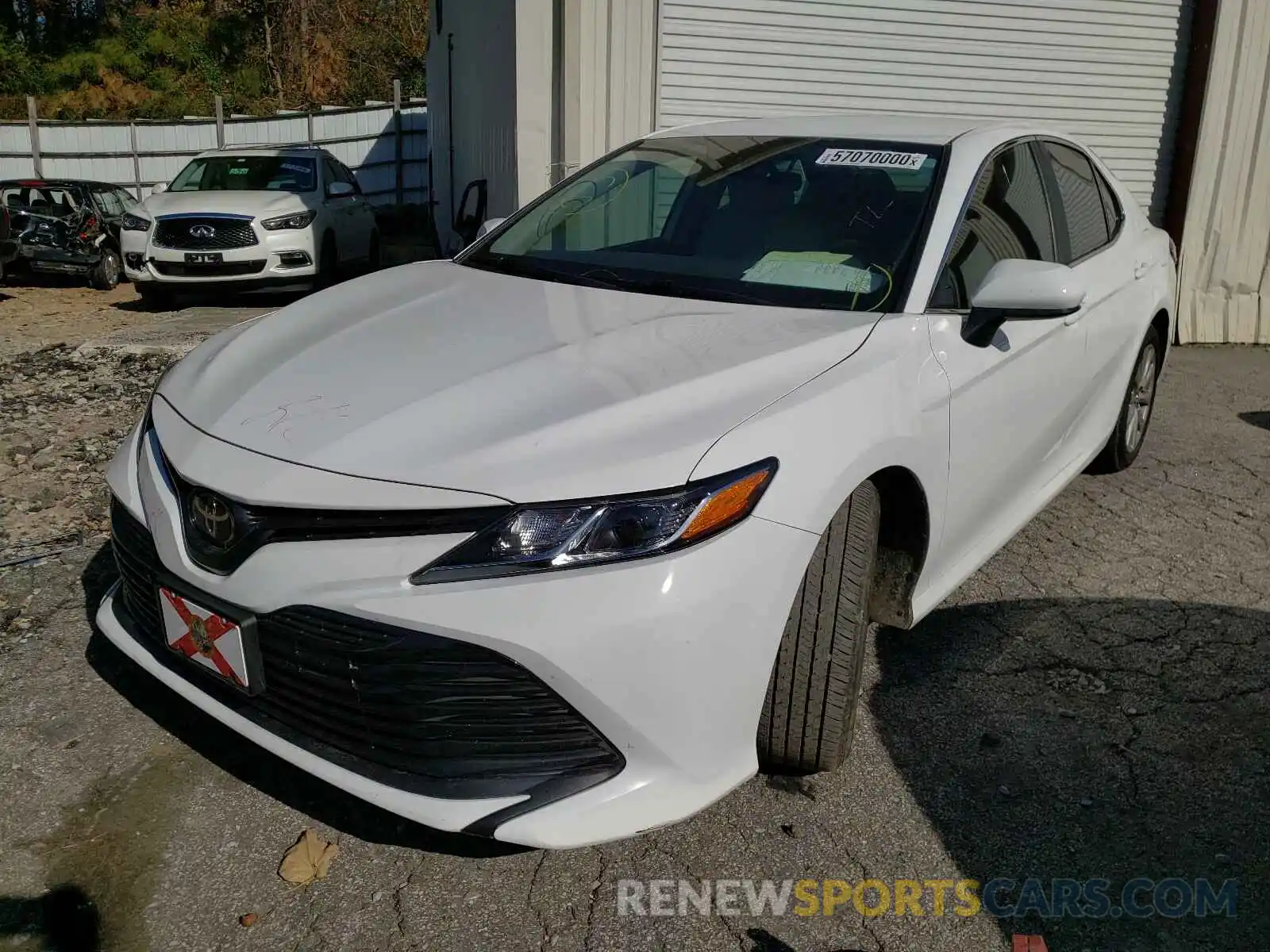 2 Photograph of a damaged car 4T1B11HK3KU803099 TOYOTA CAMRY 2019