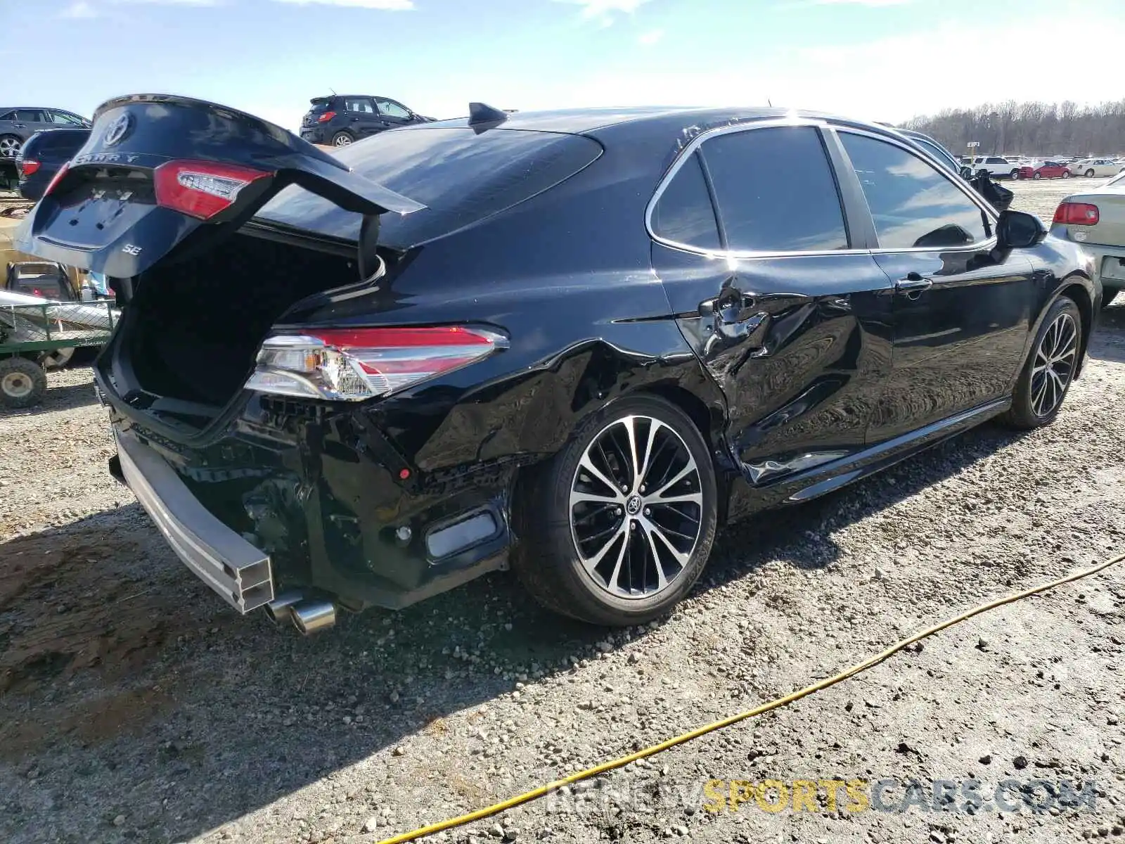 4 Photograph of a damaged car 4T1B11HK3KU807167 TOYOTA CAMRY 2019