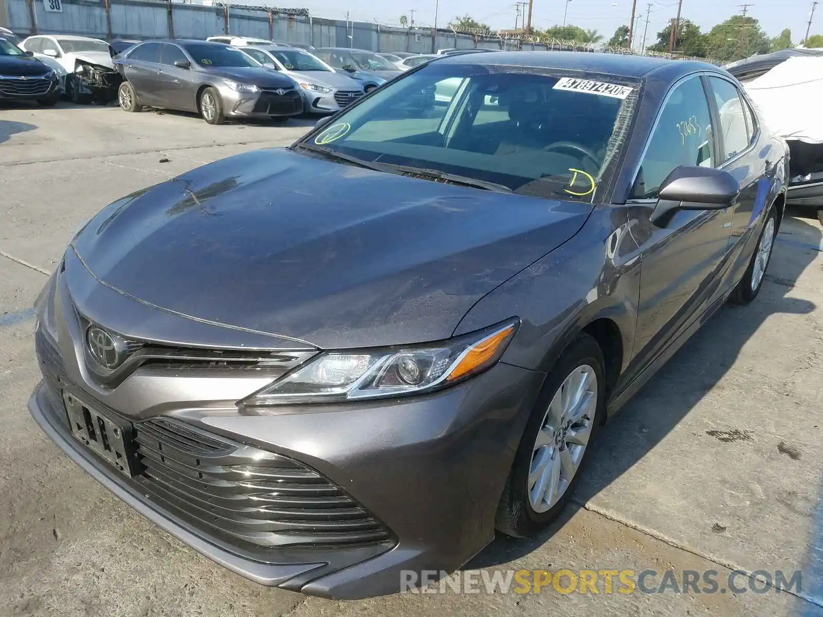 2 Photograph of a damaged car 4T1B11HK3KU807668 TOYOTA CAMRY 2019