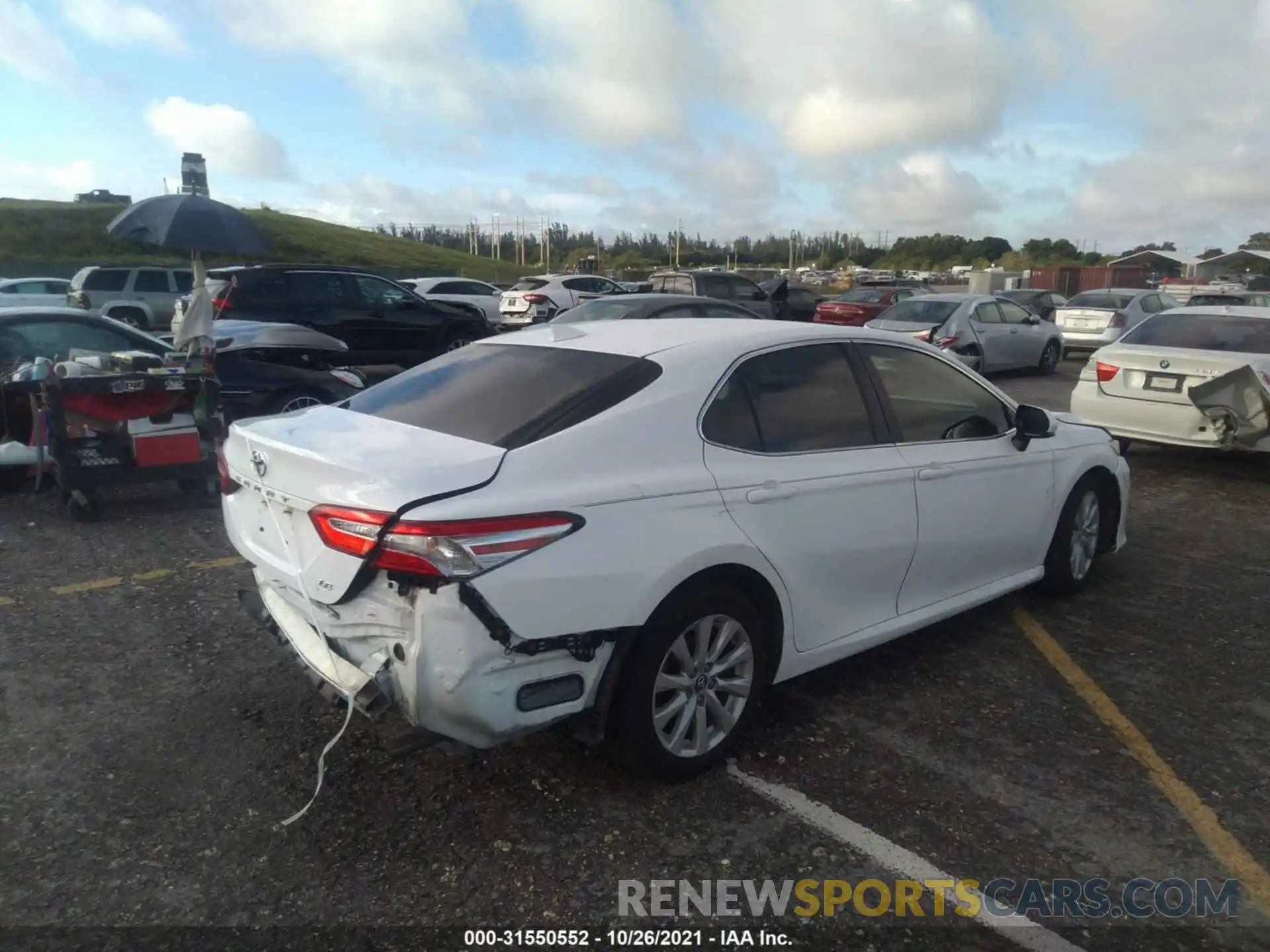 4 Photograph of a damaged car 4T1B11HK3KU808965 TOYOTA CAMRY 2019