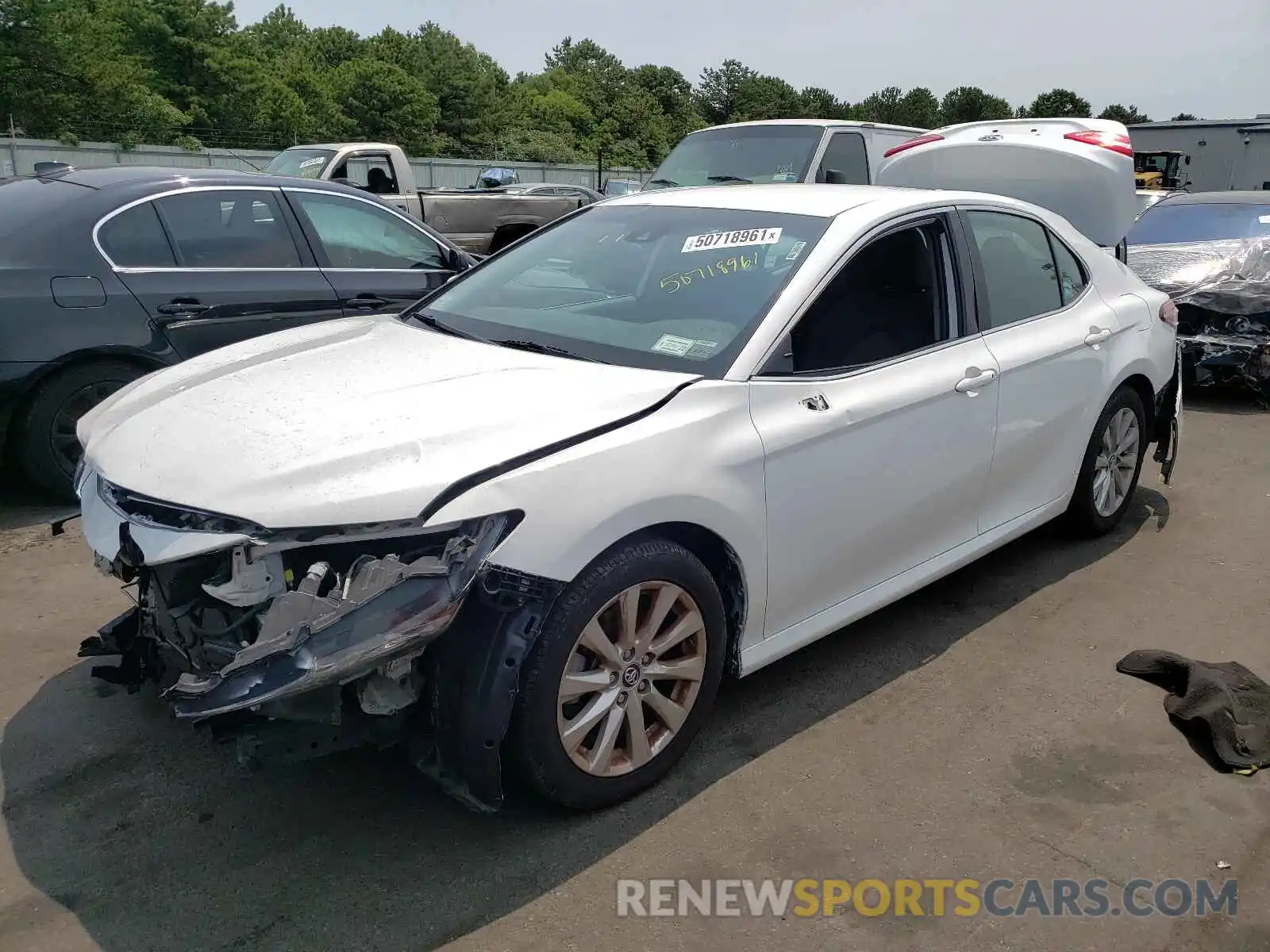 2 Photograph of a damaged car 4T1B11HK3KU811378 TOYOTA CAMRY 2019