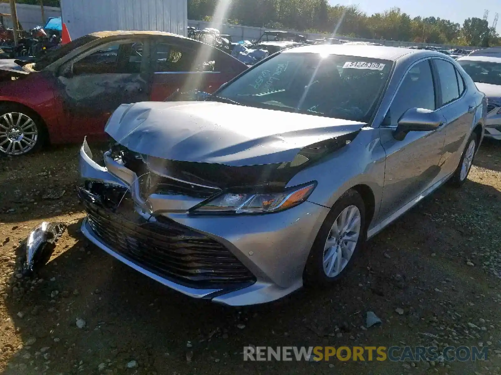 2 Photograph of a damaged car 4T1B11HK3KU814149 TOYOTA CAMRY 2019