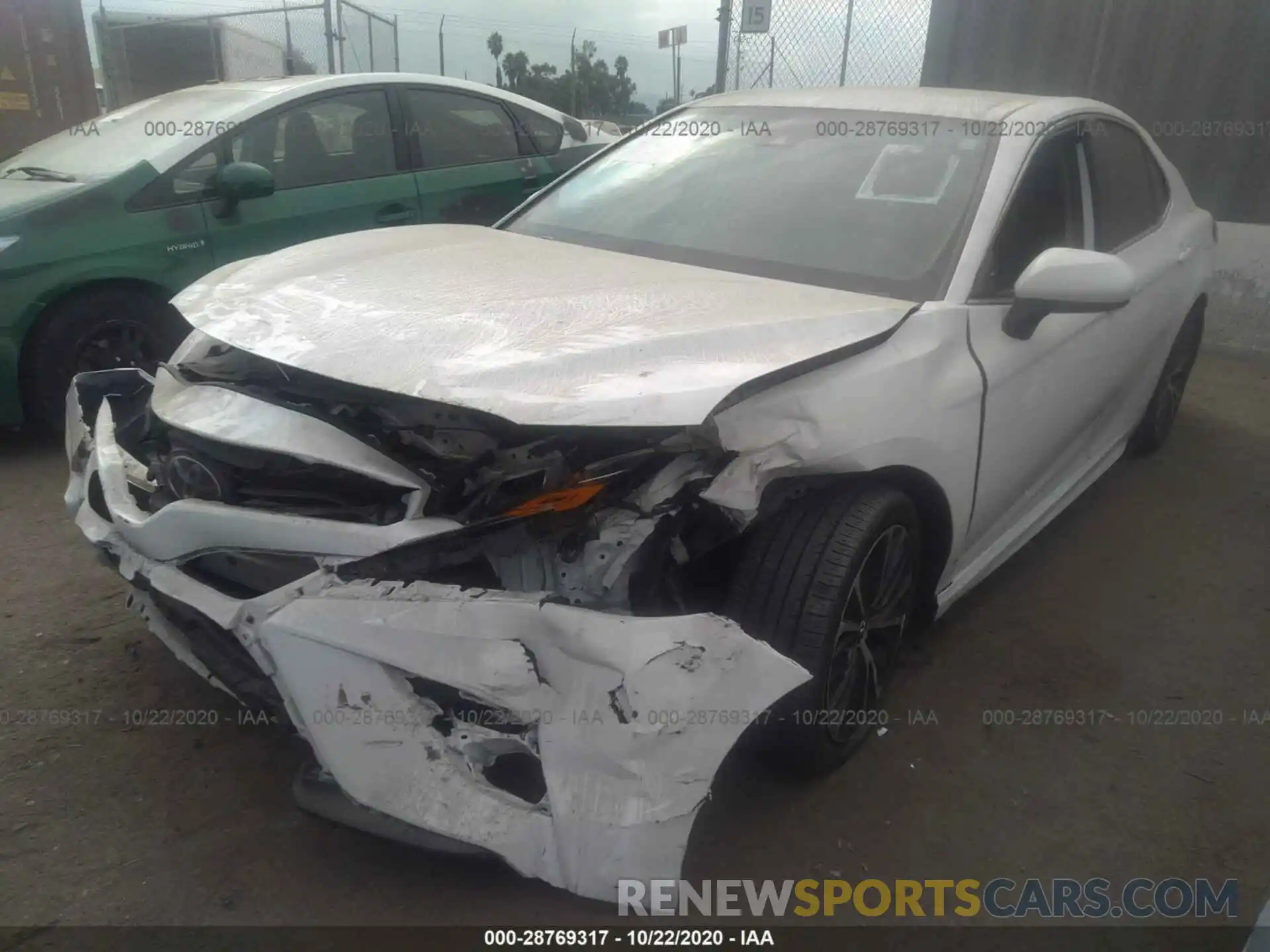 2 Photograph of a damaged car 4T1B11HK3KU815995 TOYOTA CAMRY 2019