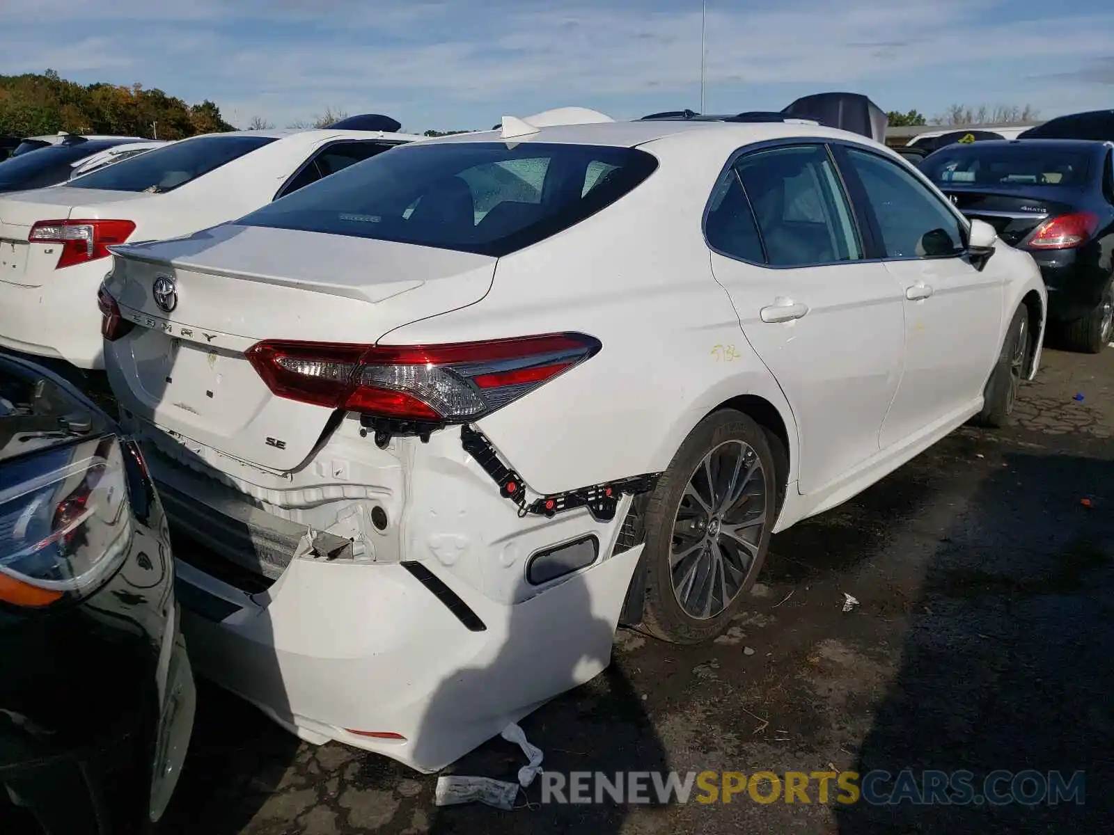 4 Photograph of a damaged car 4T1B11HK3KU816113 TOYOTA CAMRY 2019