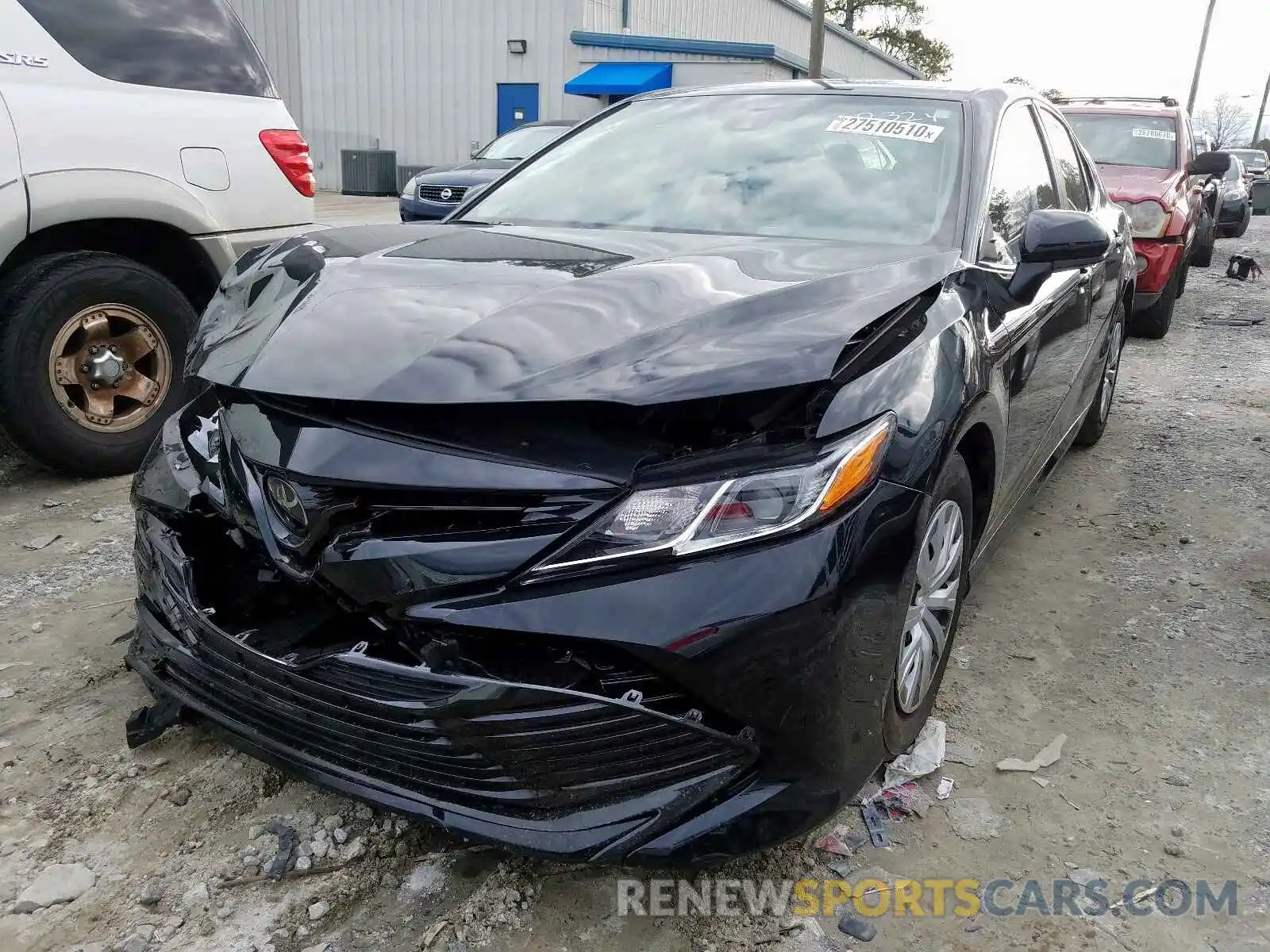 2 Photograph of a damaged car 4T1B11HK3KU820324 TOYOTA CAMRY 2019