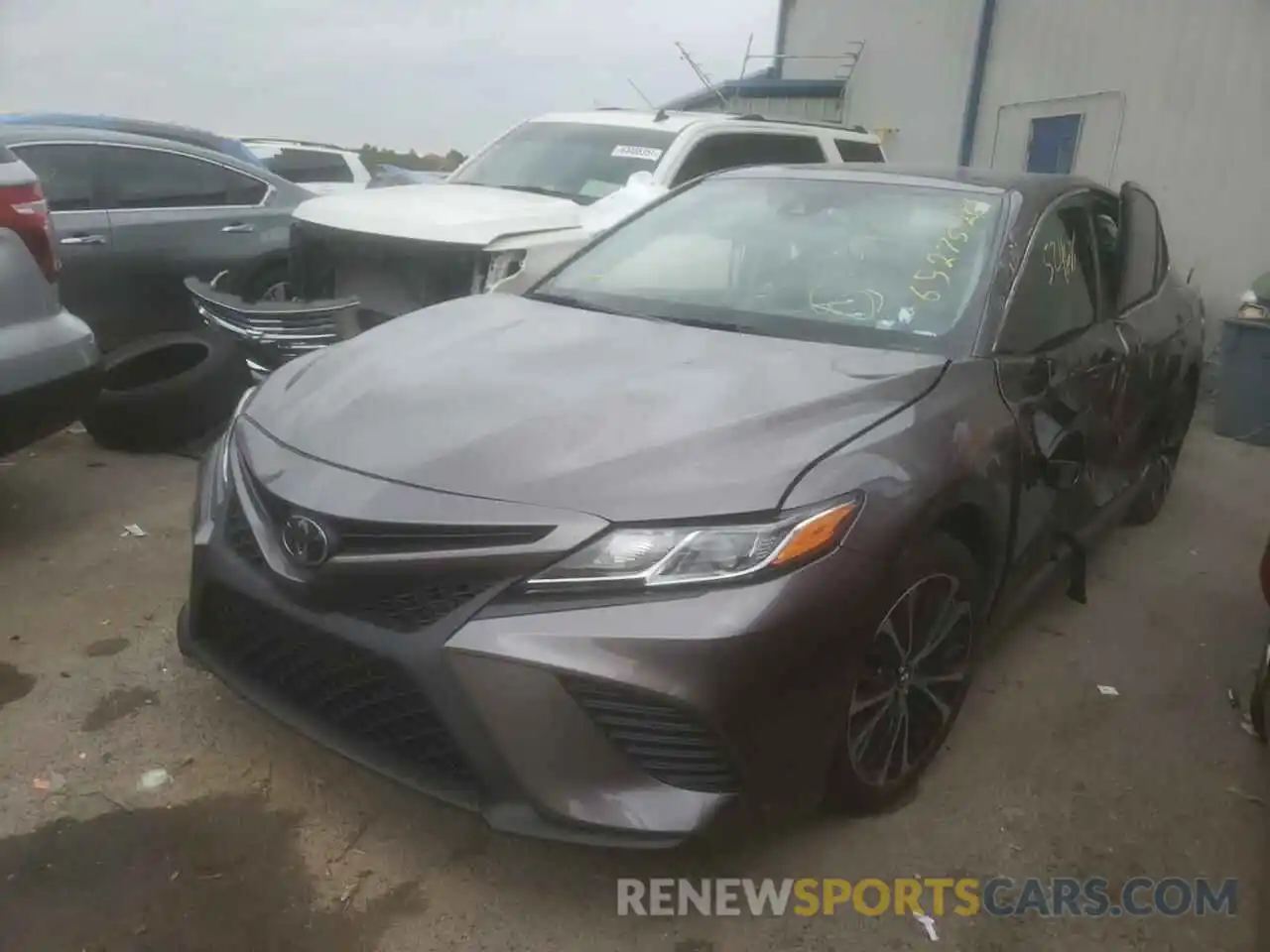 2 Photograph of a damaged car 4T1B11HK3KU820694 TOYOTA CAMRY 2019