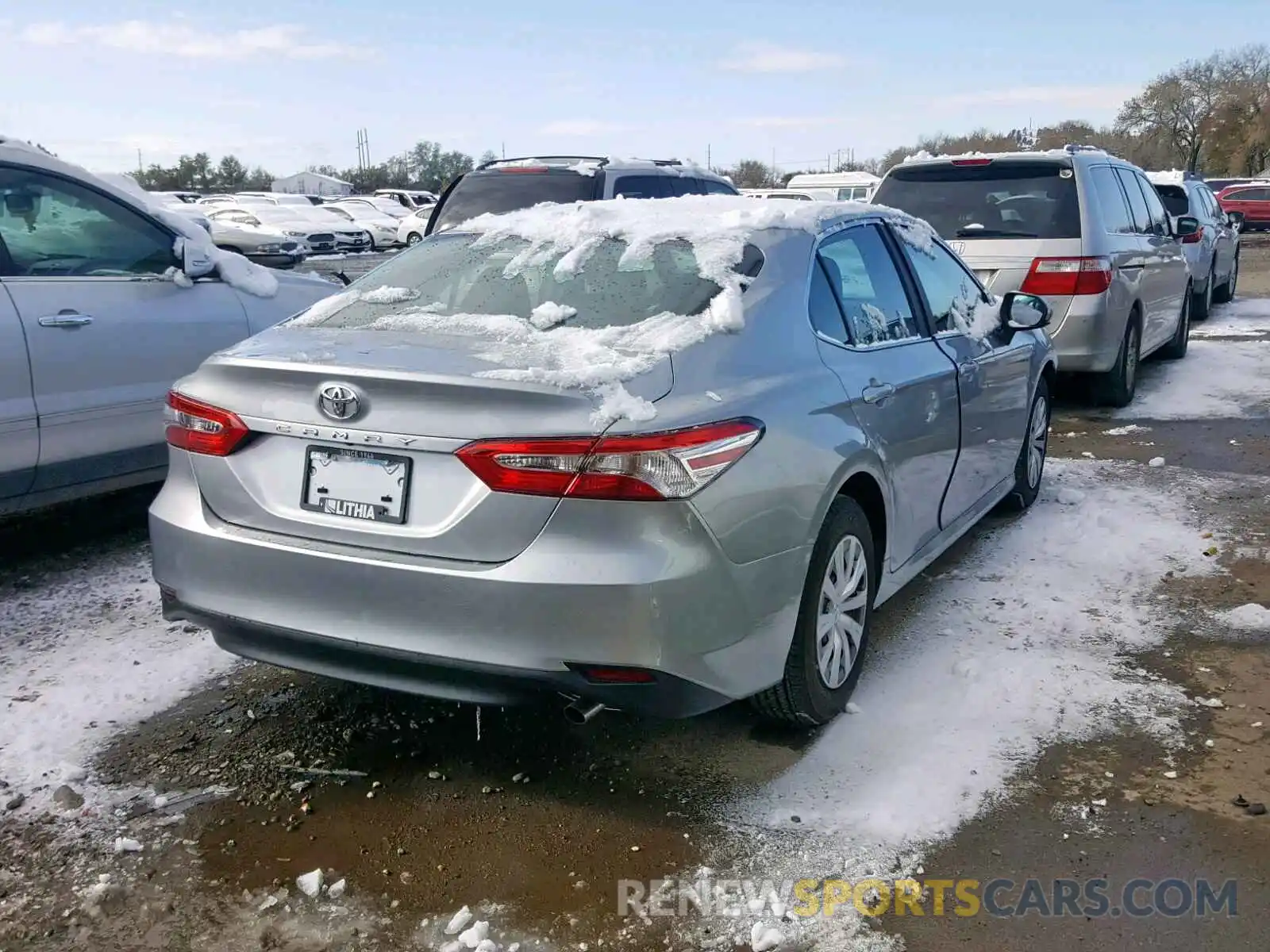 4 Photograph of a damaged car 4T1B11HK3KU821652 TOYOTA CAMRY 2019