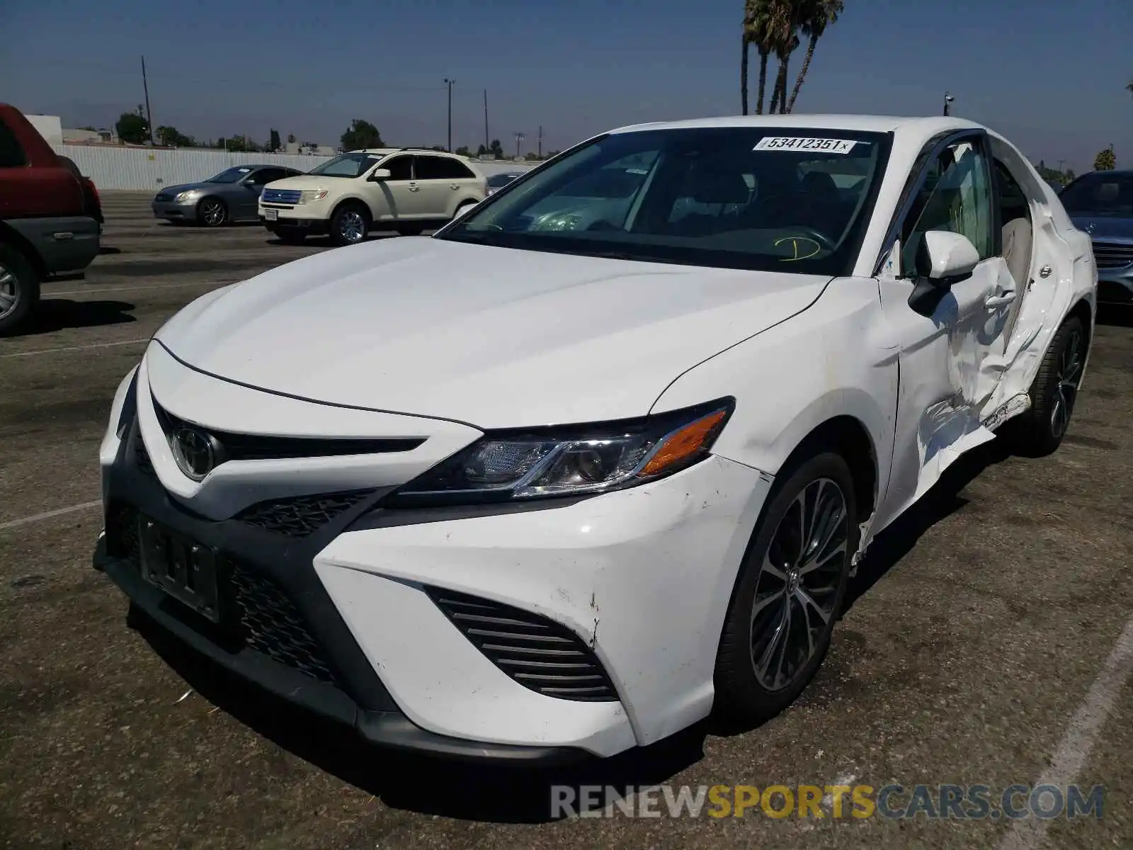 2 Photograph of a damaged car 4T1B11HK3KU823160 TOYOTA CAMRY 2019