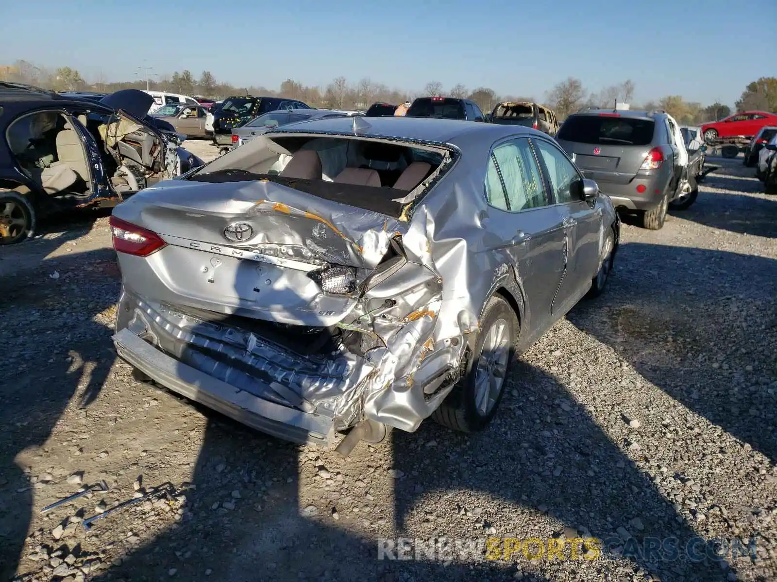 4 Photograph of a damaged car 4T1B11HK3KU823465 TOYOTA CAMRY 2019