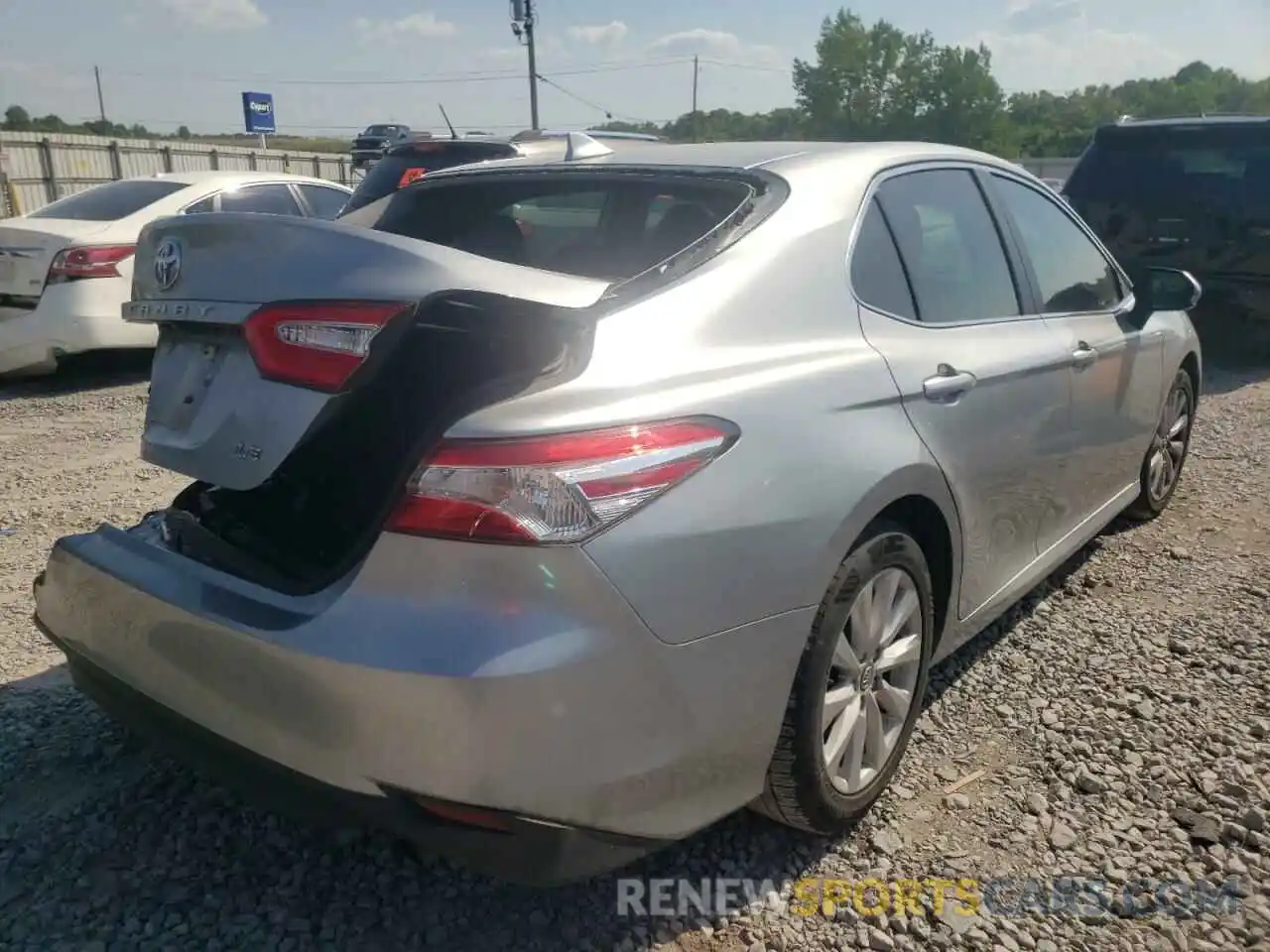 4 Photograph of a damaged car 4T1B11HK3KU825121 TOYOTA CAMRY 2019