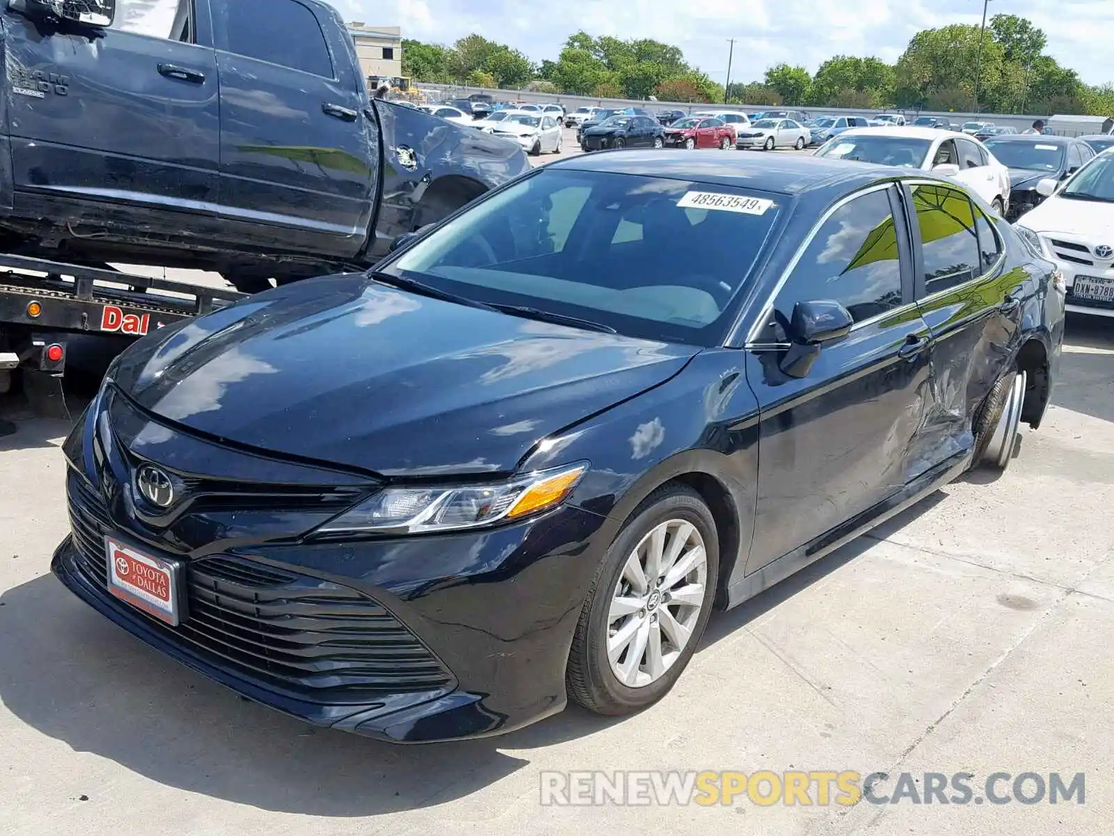 2 Photograph of a damaged car 4T1B11HK3KU826365 TOYOTA CAMRY 2019