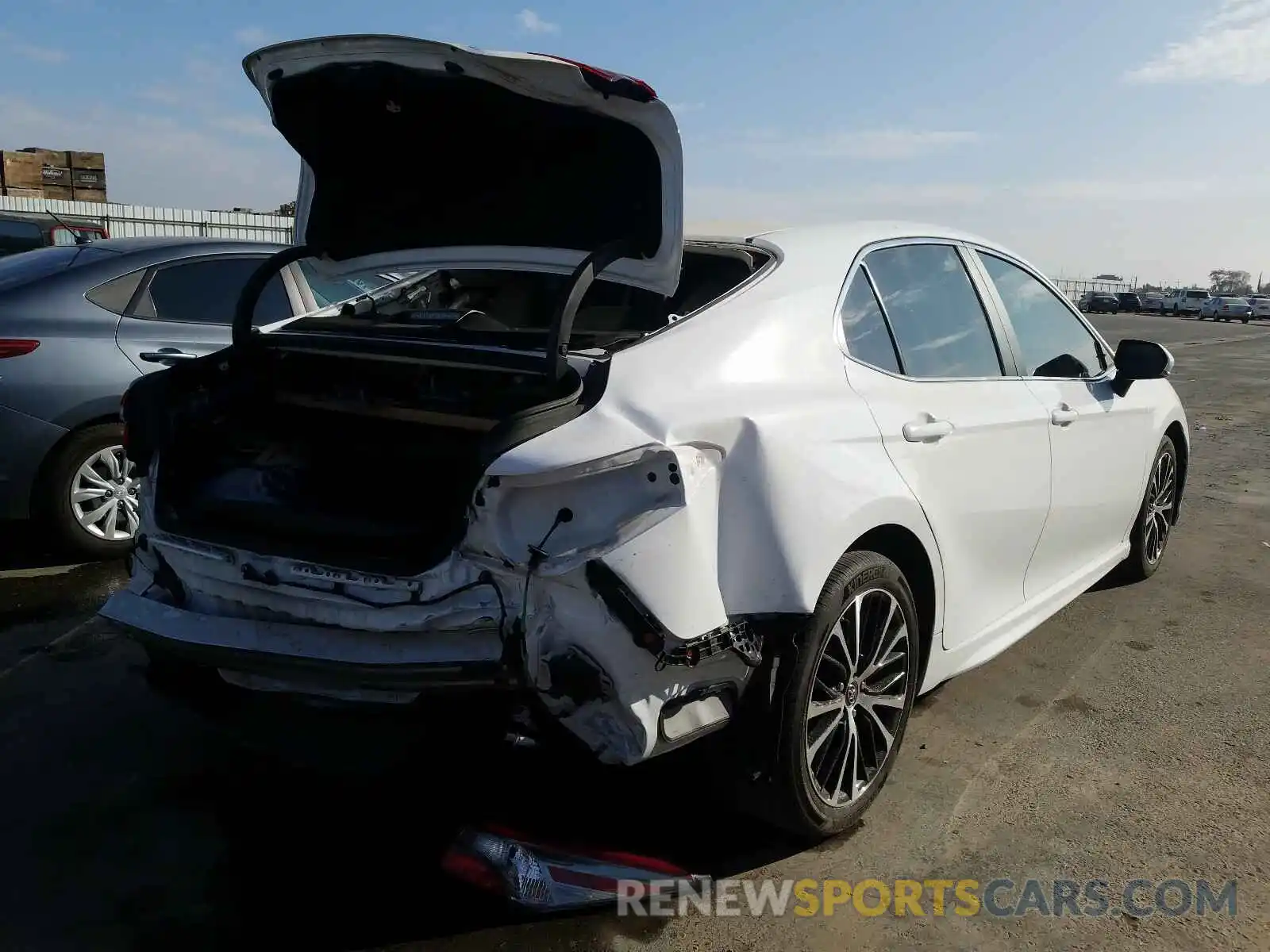 4 Photograph of a damaged car 4T1B11HK3KU826799 TOYOTA CAMRY 2019