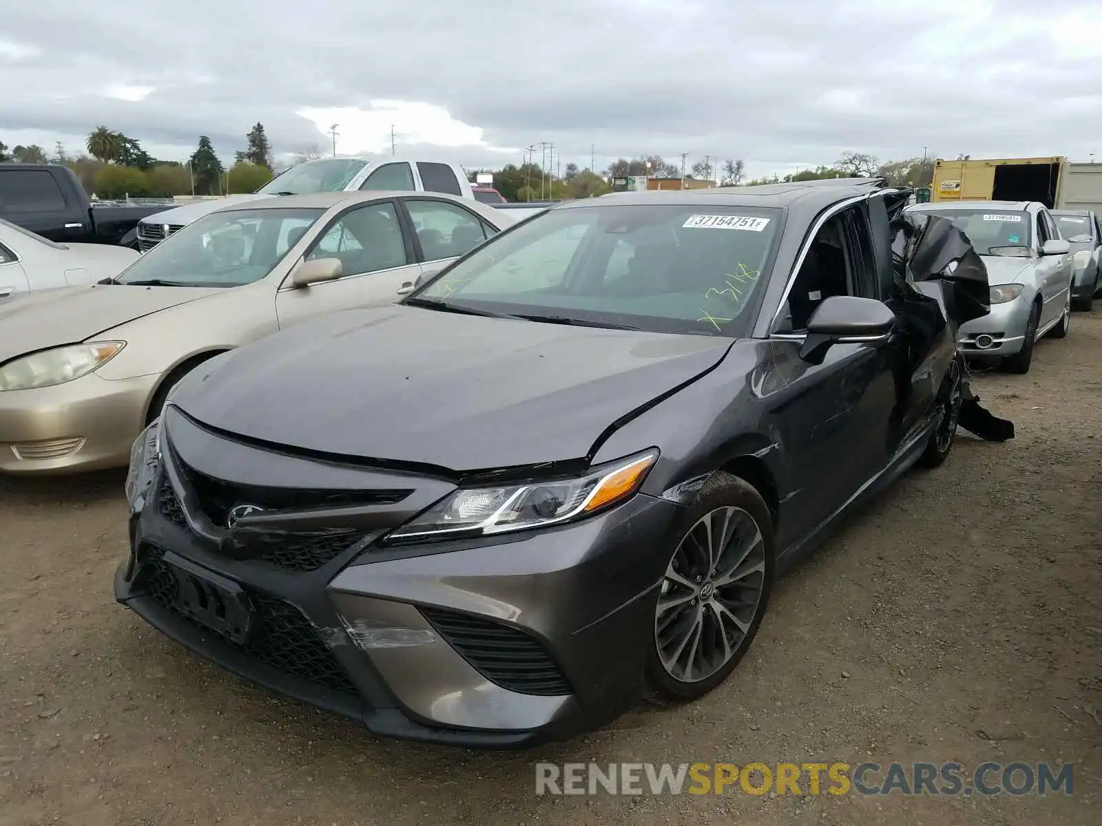 2 Photograph of a damaged car 4T1B11HK3KU829850 TOYOTA CAMRY 2019