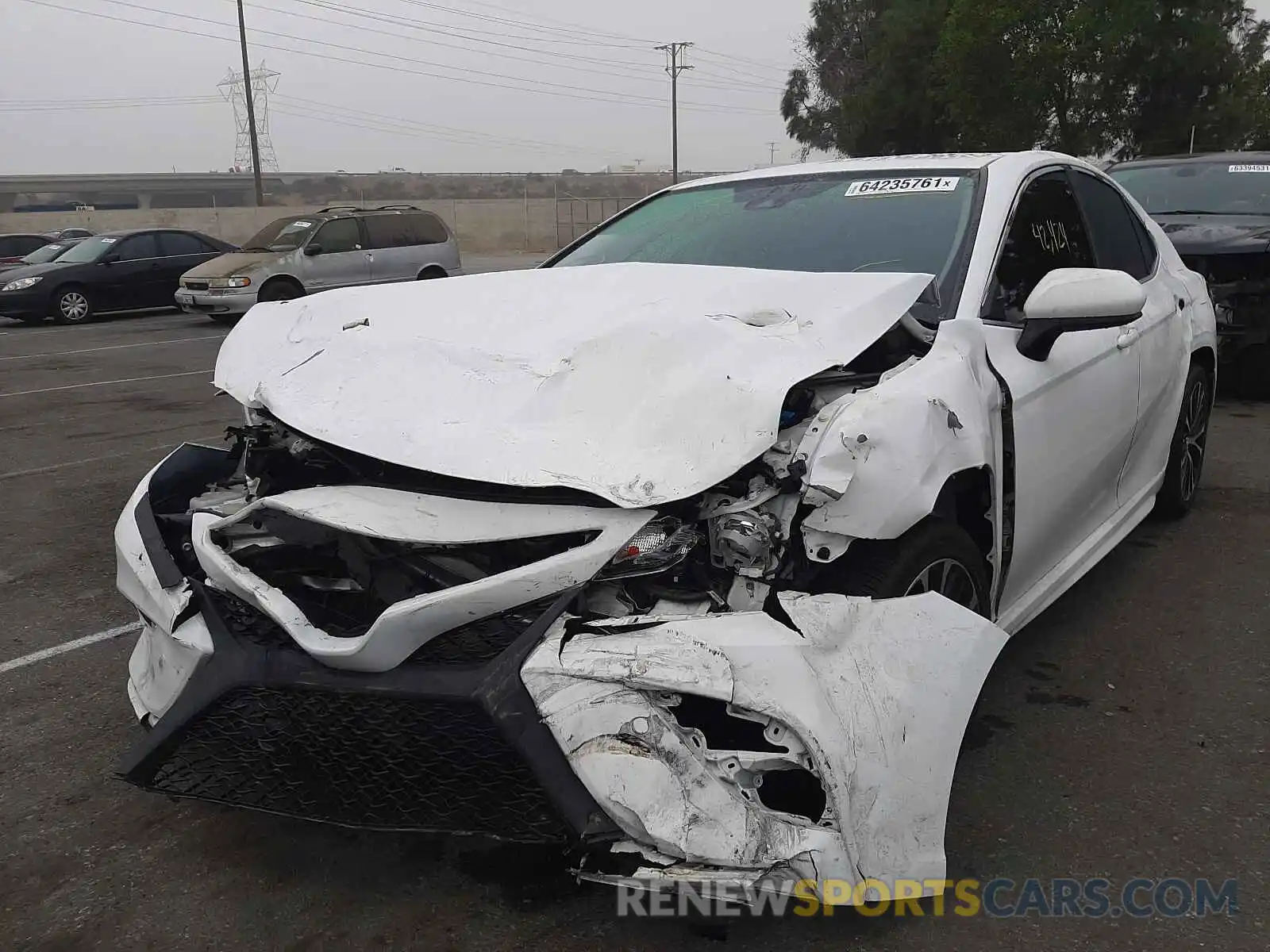 2 Photograph of a damaged car 4T1B11HK3KU829881 TOYOTA CAMRY 2019