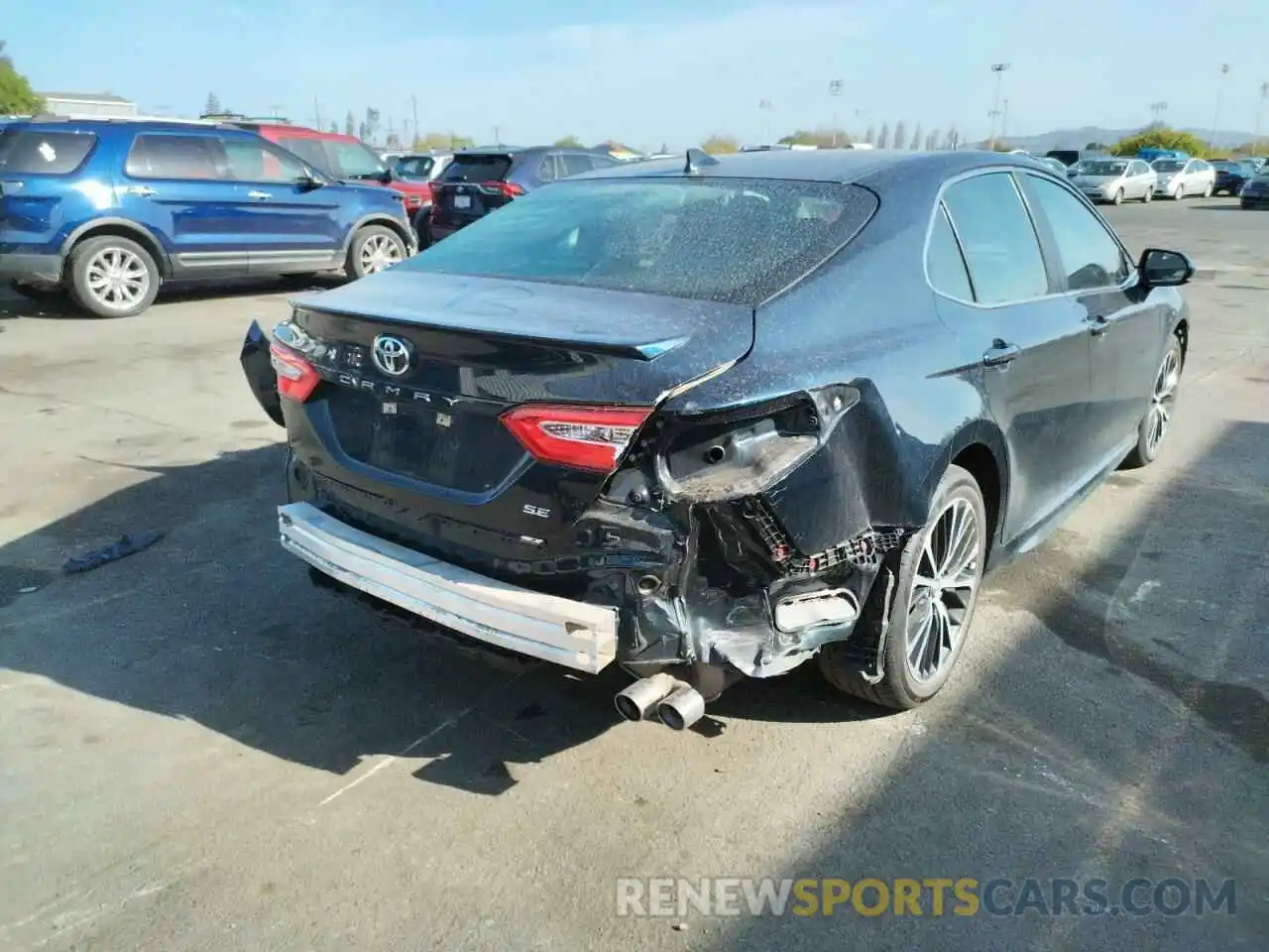 4 Photograph of a damaged car 4T1B11HK3KU833946 TOYOTA CAMRY 2019