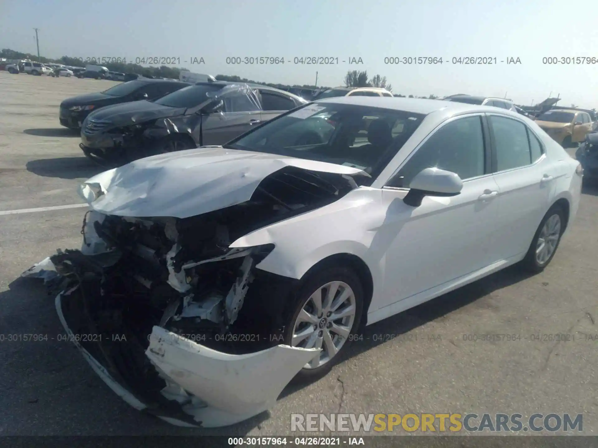 2 Photograph of a damaged car 4T1B11HK3KU834594 TOYOTA CAMRY 2019