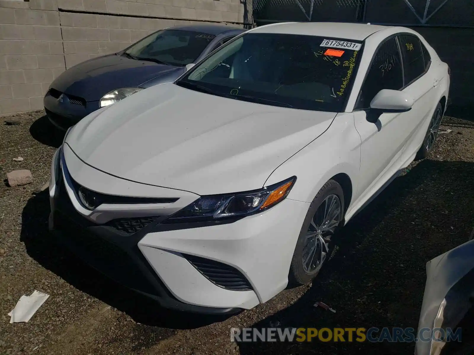 2 Photograph of a damaged car 4T1B11HK3KU841996 TOYOTA CAMRY 2019