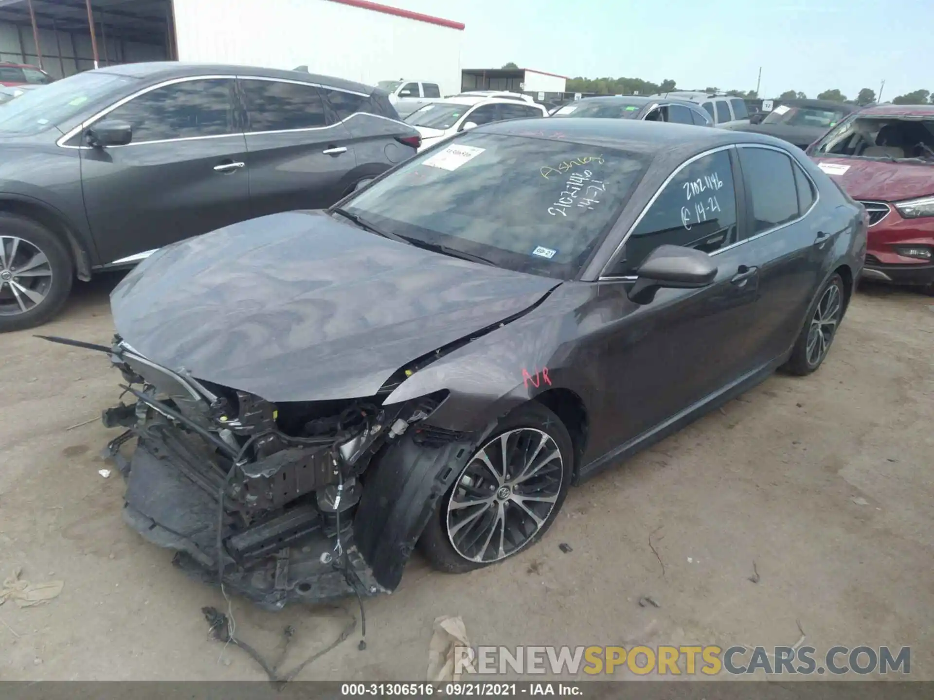 2 Photograph of a damaged car 4T1B11HK3KU847653 TOYOTA CAMRY 2019