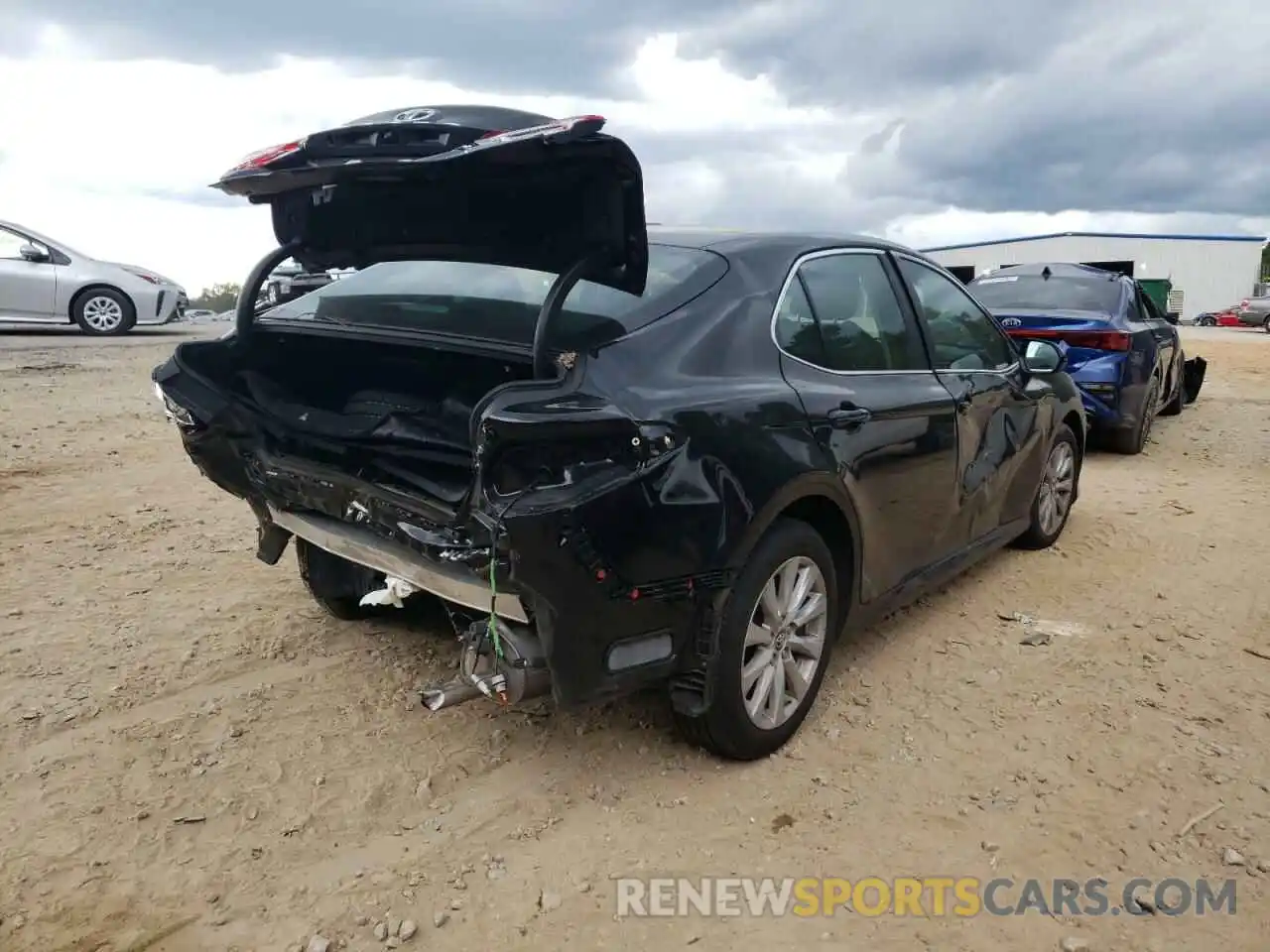 4 Photograph of a damaged car 4T1B11HK3KU854201 TOYOTA CAMRY 2019