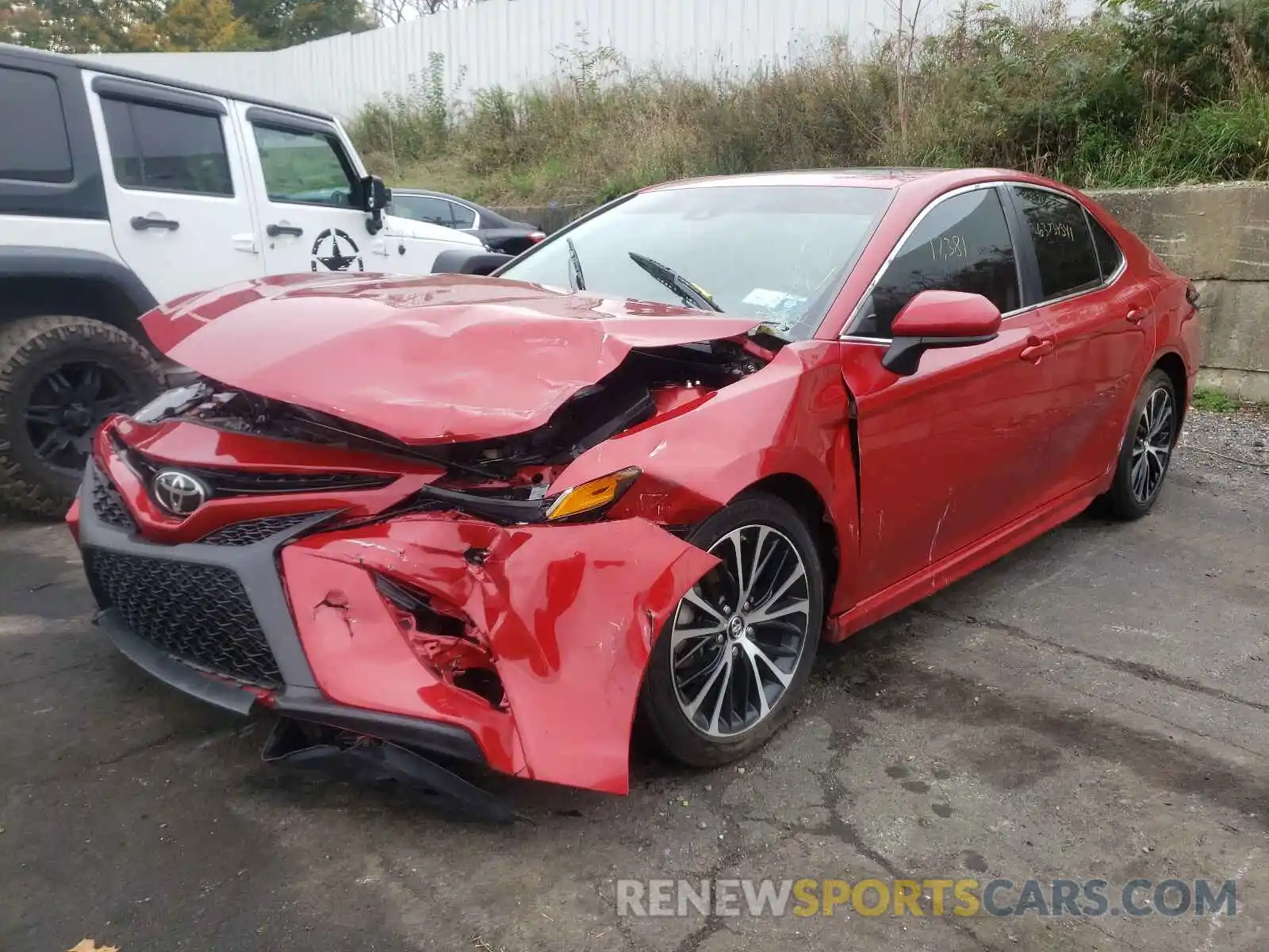 2 Photograph of a damaged car 4T1B11HK4KU162304 TOYOTA CAMRY 2019