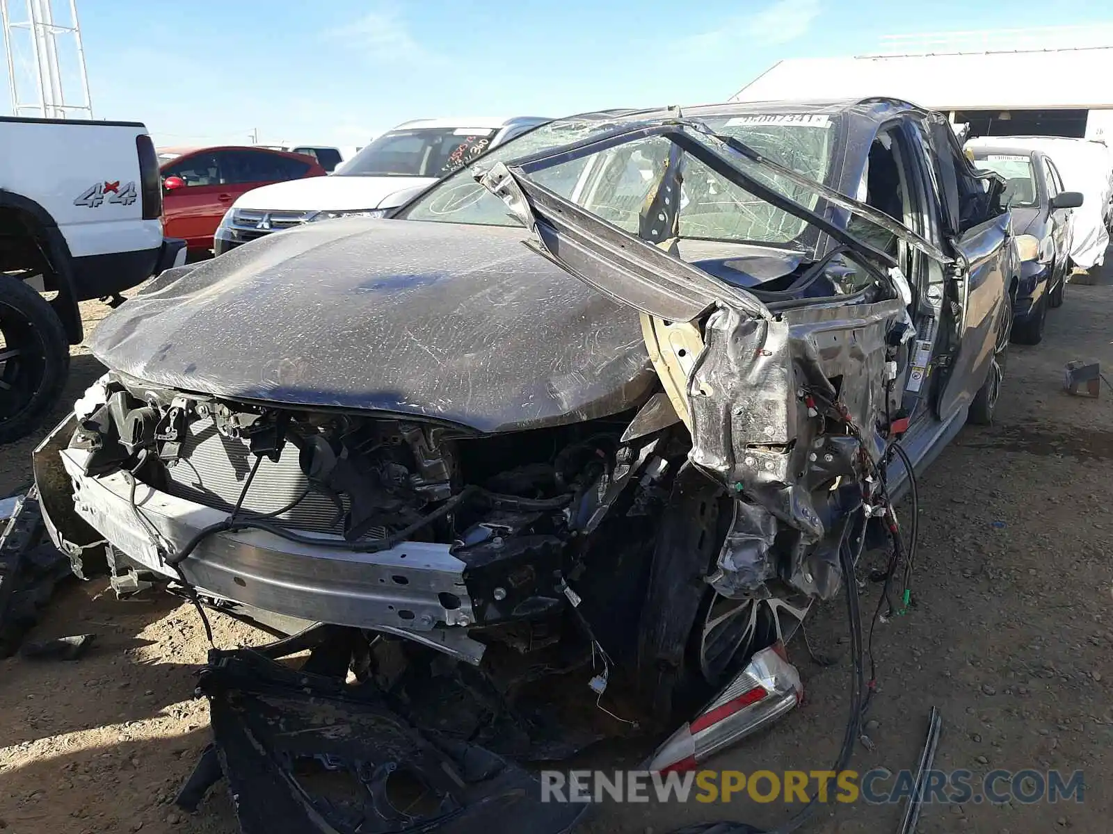 2 Photograph of a damaged car 4T1B11HK4KU163744 TOYOTA CAMRY 2019