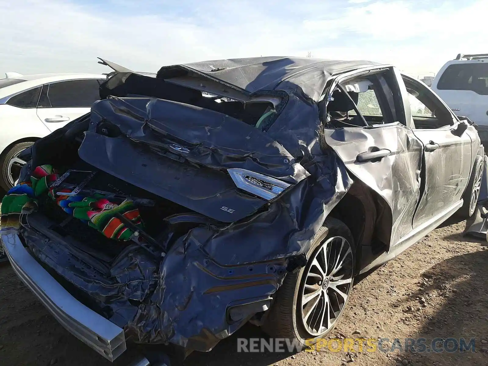 4 Photograph of a damaged car 4T1B11HK4KU163744 TOYOTA CAMRY 2019