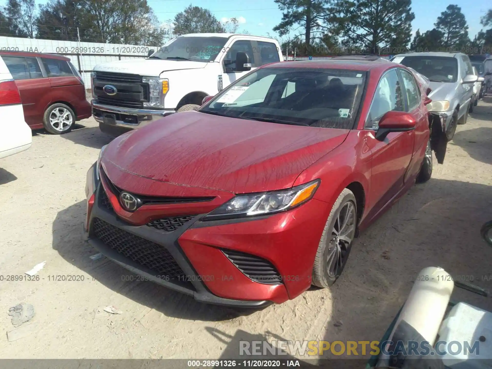 2 Photograph of a damaged car 4T1B11HK4KU163808 TOYOTA CAMRY 2019