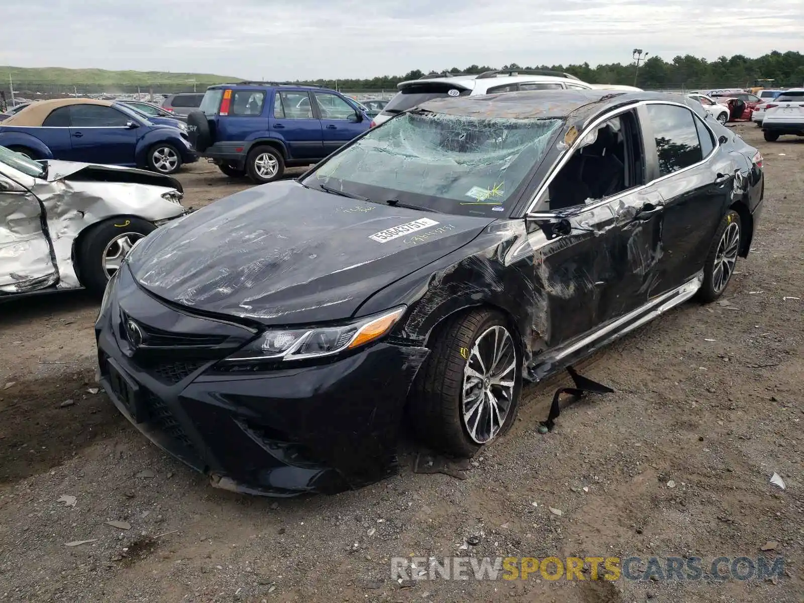 2 Photograph of a damaged car 4T1B11HK4KU166255 TOYOTA CAMRY 2019