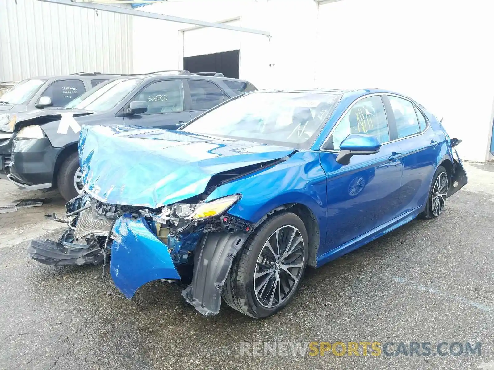 2 Photograph of a damaged car 4T1B11HK4KU168393 TOYOTA CAMRY 2019