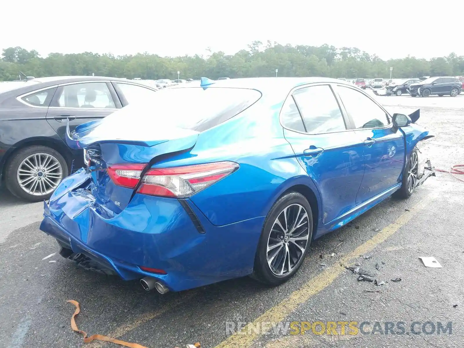 4 Photograph of a damaged car 4T1B11HK4KU168393 TOYOTA CAMRY 2019