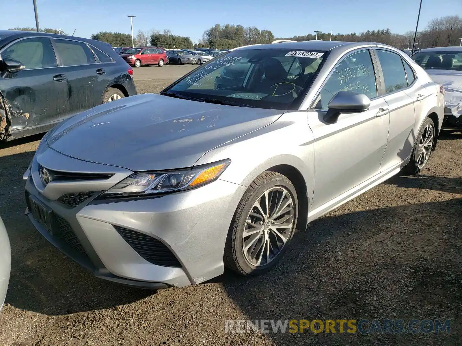 2 Photograph of a damaged car 4T1B11HK4KU168748 TOYOTA CAMRY 2019