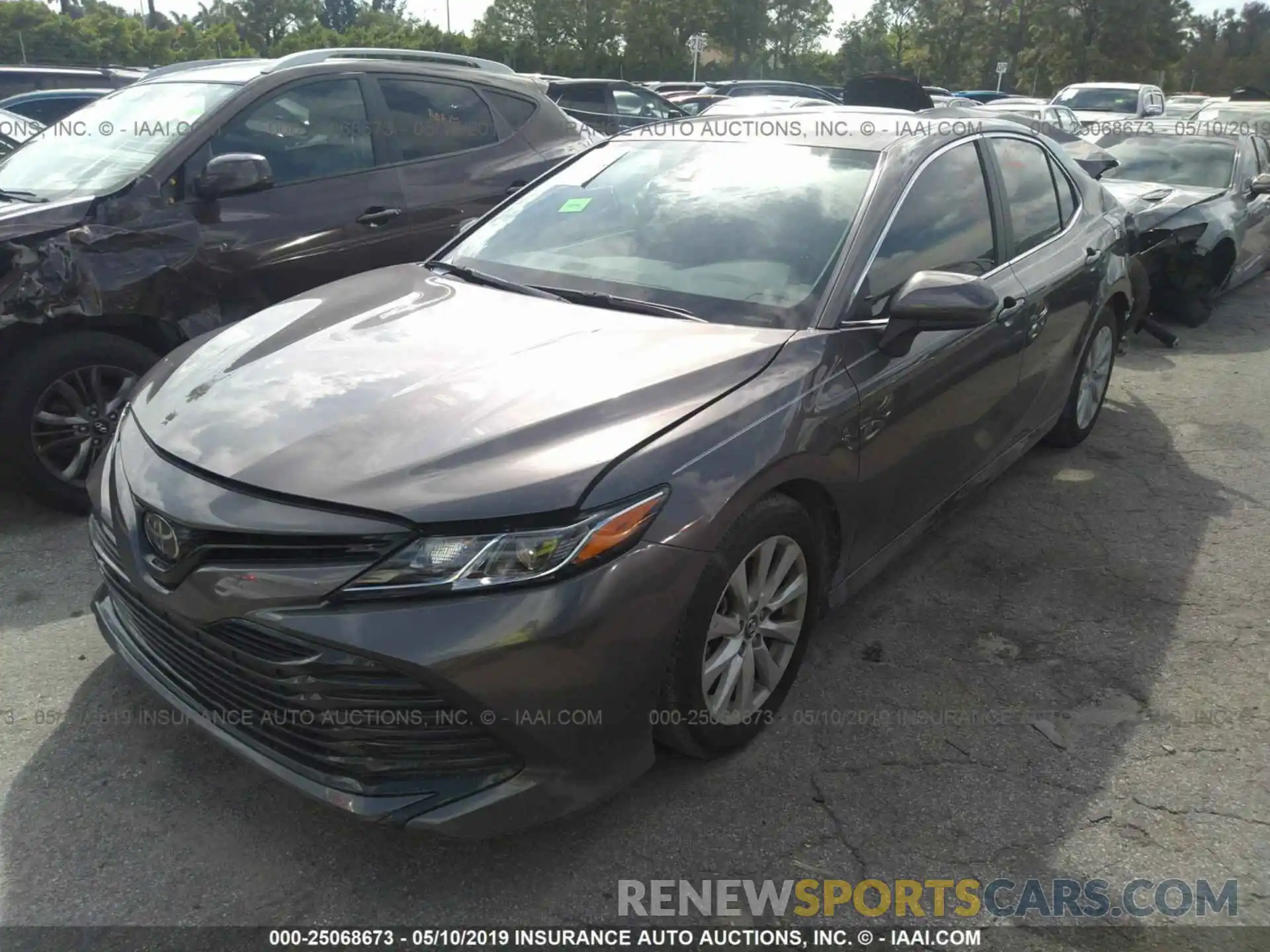 2 Photograph of a damaged car 4T1B11HK4KU169060 TOYOTA CAMRY 2019