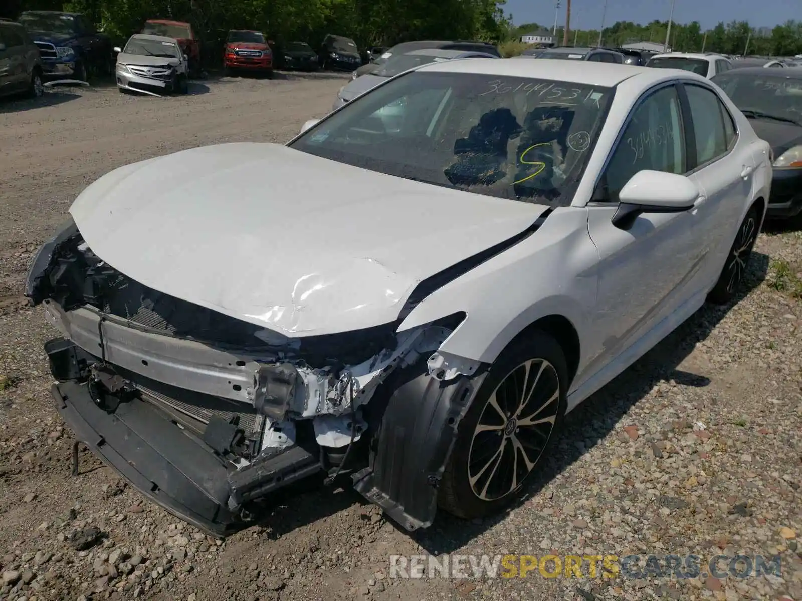 2 Photograph of a damaged car 4T1B11HK4KU169673 TOYOTA CAMRY 2019