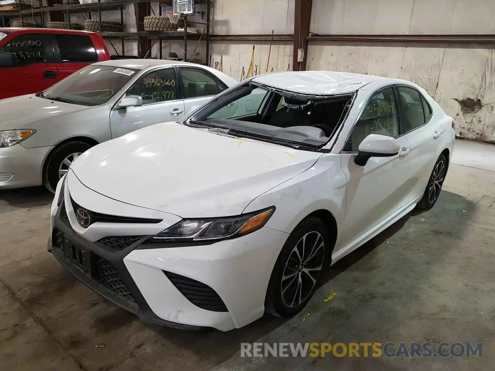 2 Photograph of a damaged car 4T1B11HK4KU173349 TOYOTA CAMRY 2019