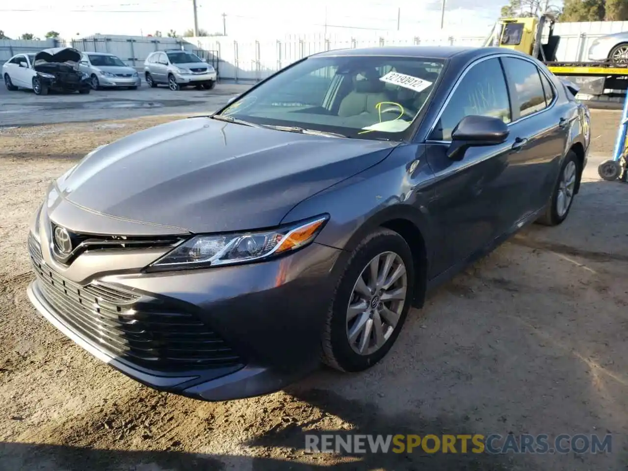 2 Photograph of a damaged car 4T1B11HK4KU174954 TOYOTA CAMRY 2019