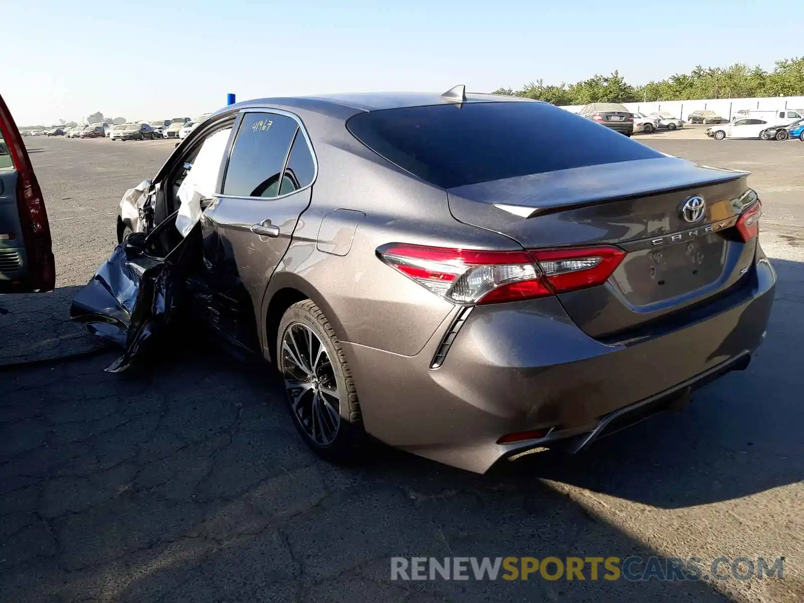 3 Photograph of a damaged car 4T1B11HK4KU177983 TOYOTA CAMRY 2019