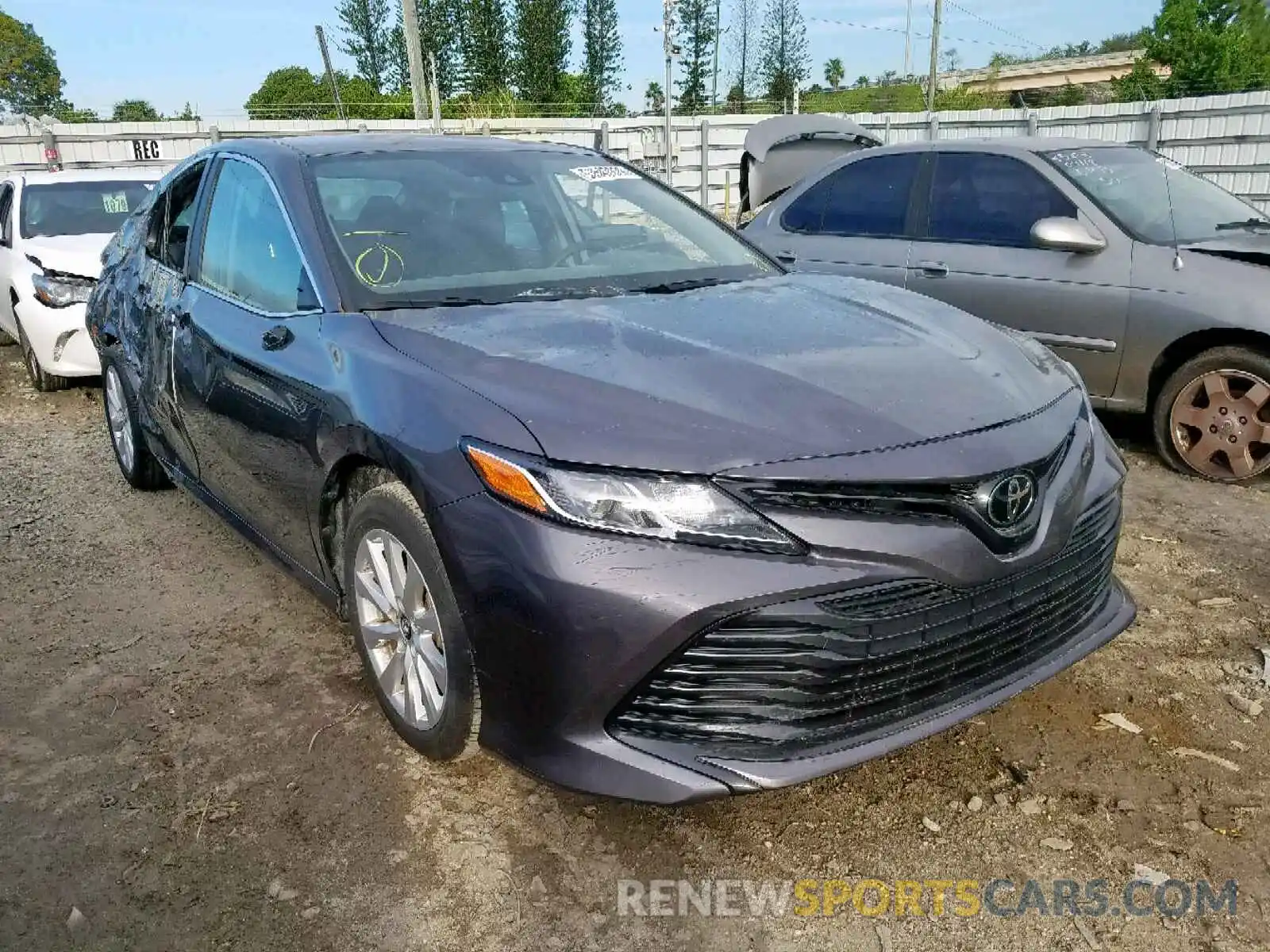 1 Photograph of a damaged car 4T1B11HK4KU182374 TOYOTA CAMRY 2019