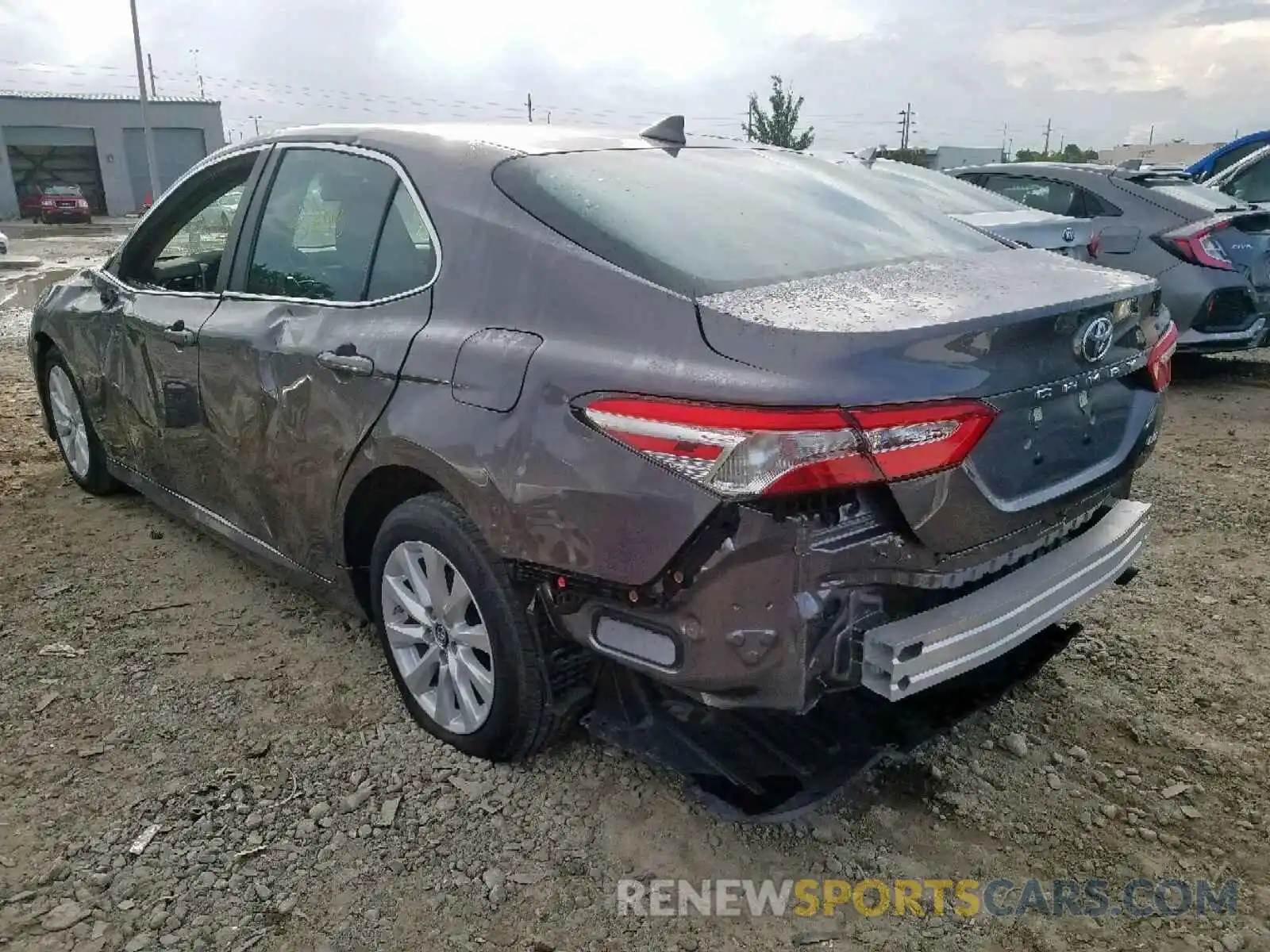 3 Photograph of a damaged car 4T1B11HK4KU182374 TOYOTA CAMRY 2019