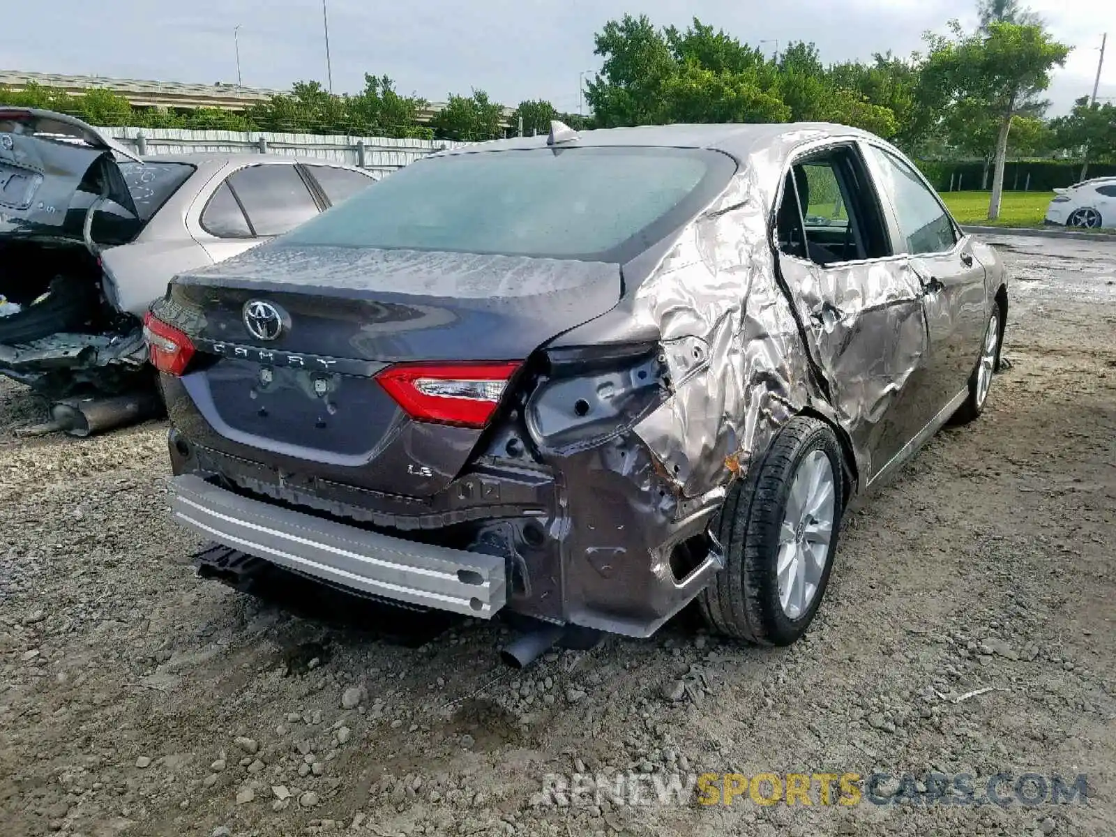 4 Photograph of a damaged car 4T1B11HK4KU182374 TOYOTA CAMRY 2019