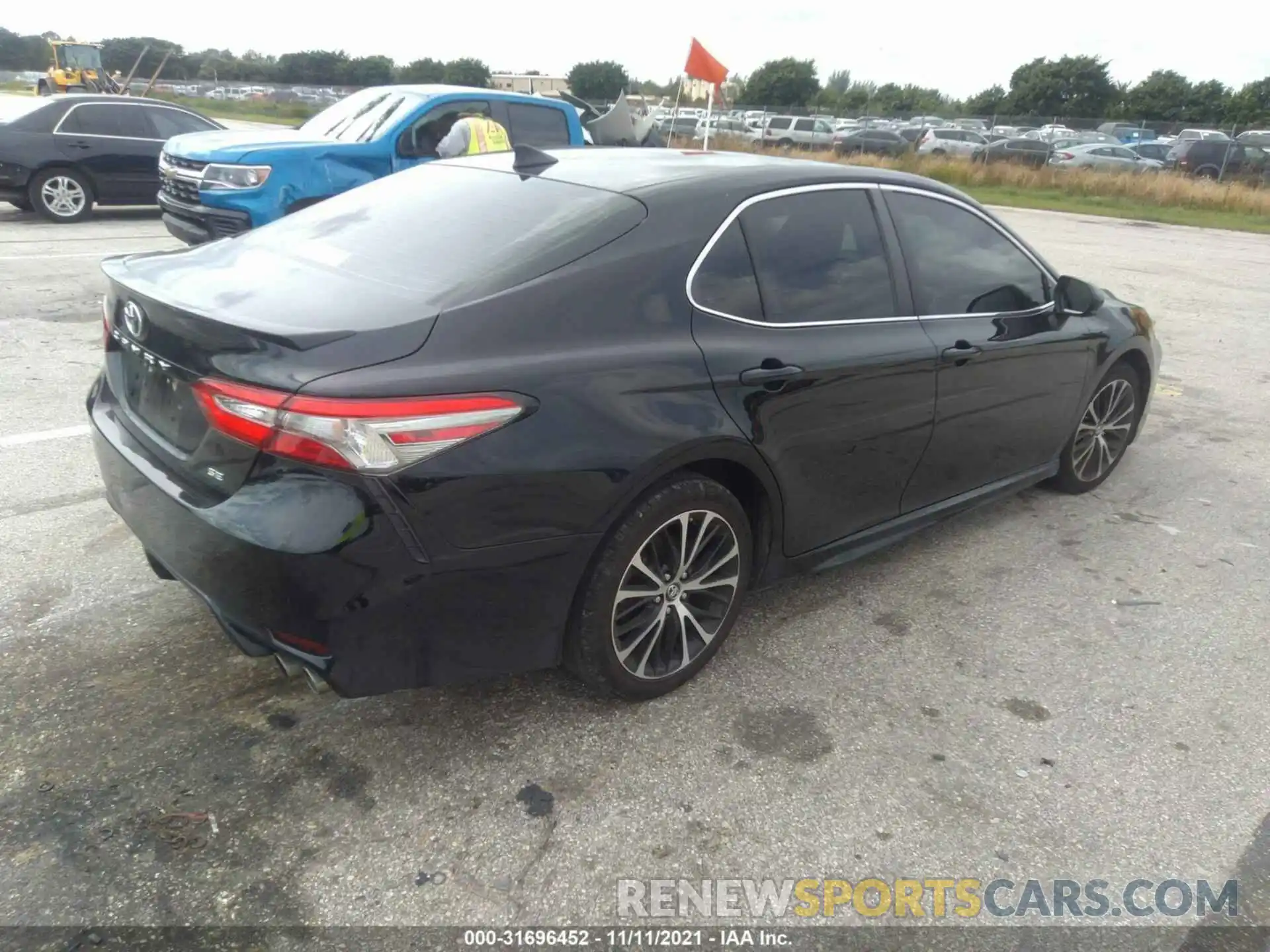 4 Photograph of a damaged car 4T1B11HK4KU185503 TOYOTA CAMRY 2019