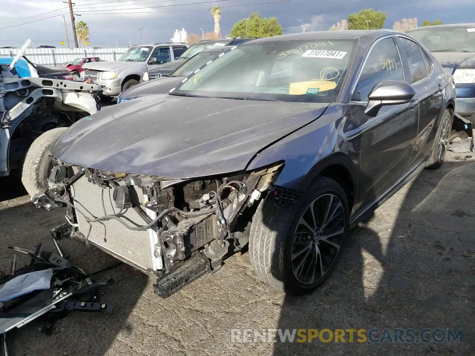 2 Photograph of a damaged car 4T1B11HK4KU190250 TOYOTA CAMRY 2019