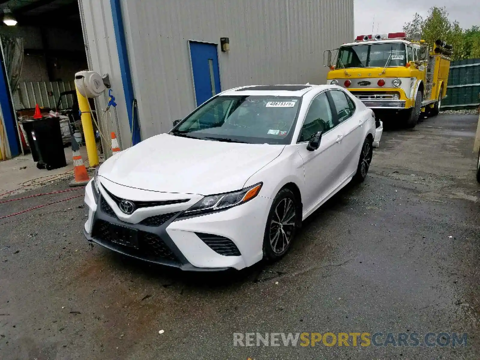 2 Photograph of a damaged car 4T1B11HK4KU195979 TOYOTA CAMRY 2019